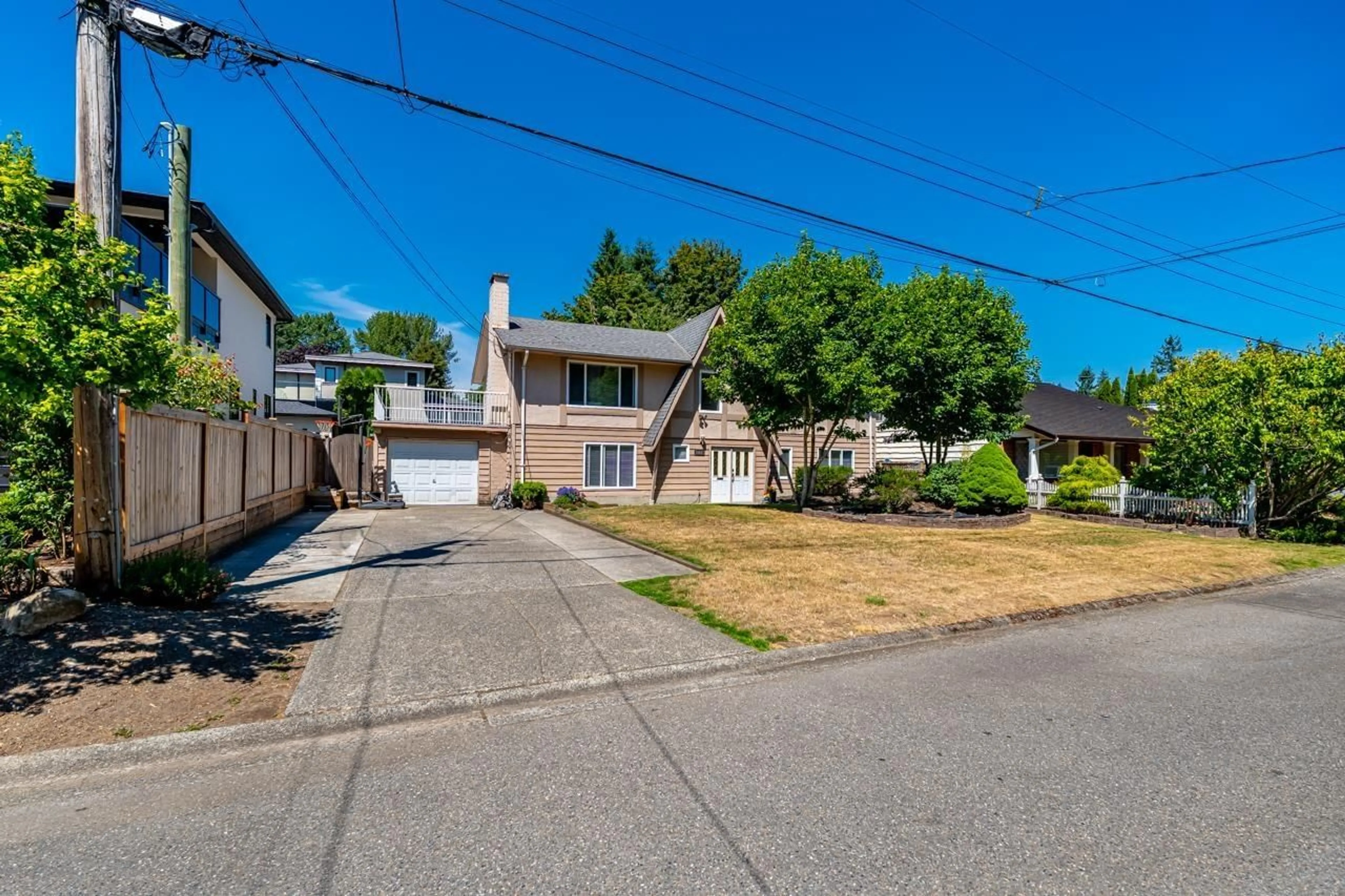 A pic from outside/outdoor area/front of a property/back of a property/a pic from drone, street for 10867 64A AVENUE, Delta British Columbia V4E1E2