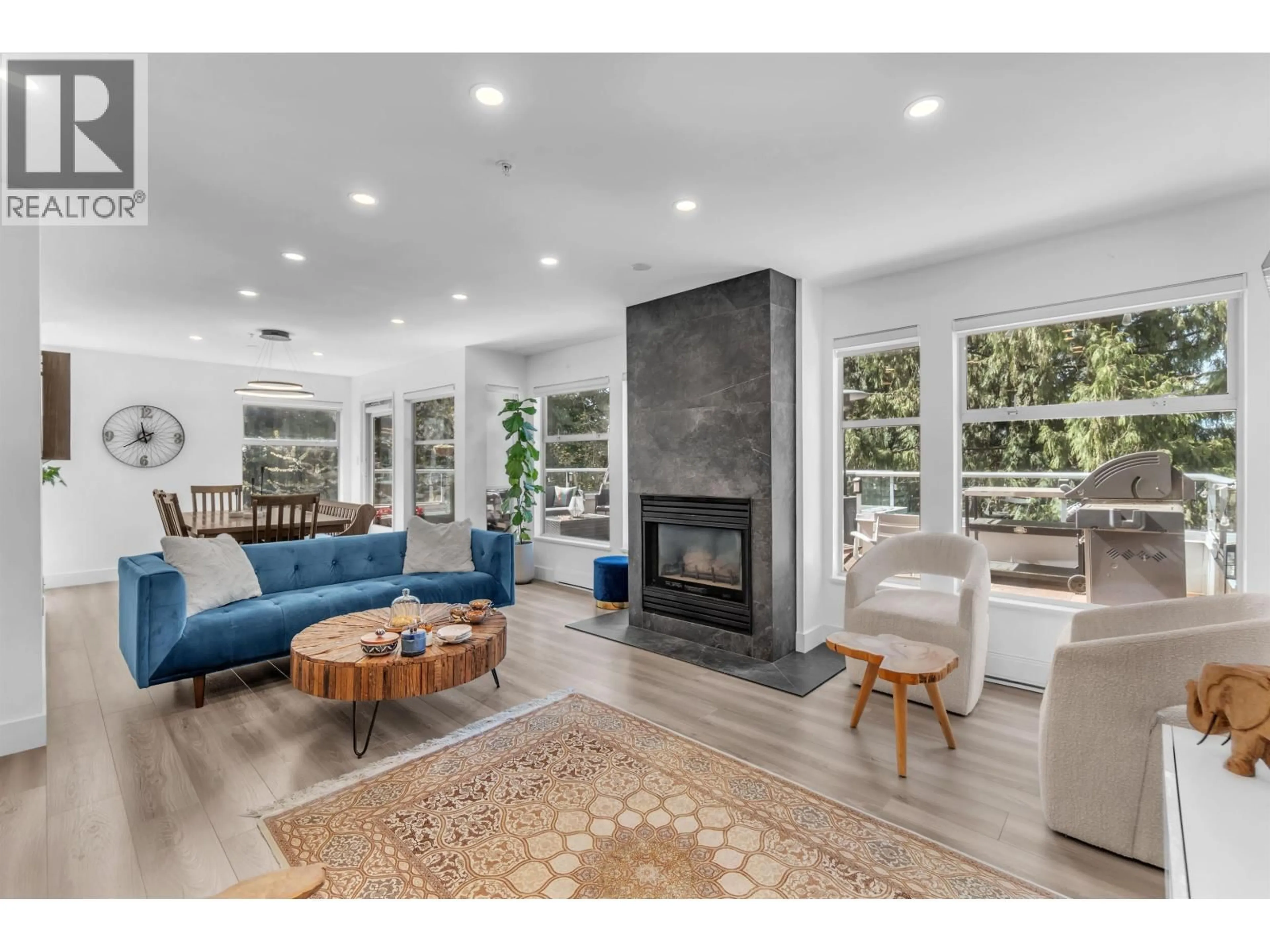 Living room with furniture, unknown for 8 - 2425 EDGEMONT BOULEVARD, North Vancouver British Columbia V7P2L2