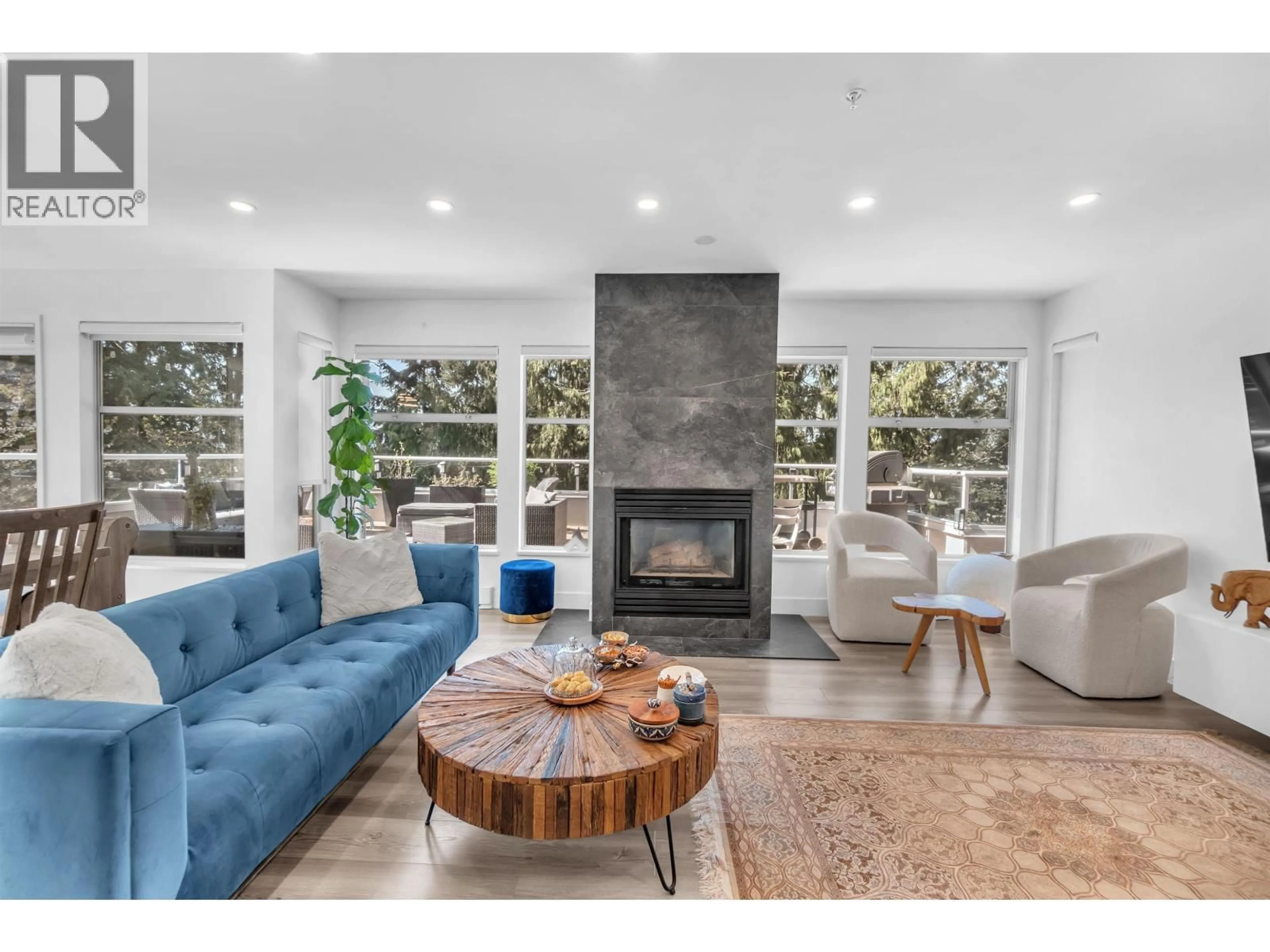 Living room with furniture, unknown for 8 - 2425 EDGEMONT BOULEVARD, North Vancouver British Columbia V7P2L2