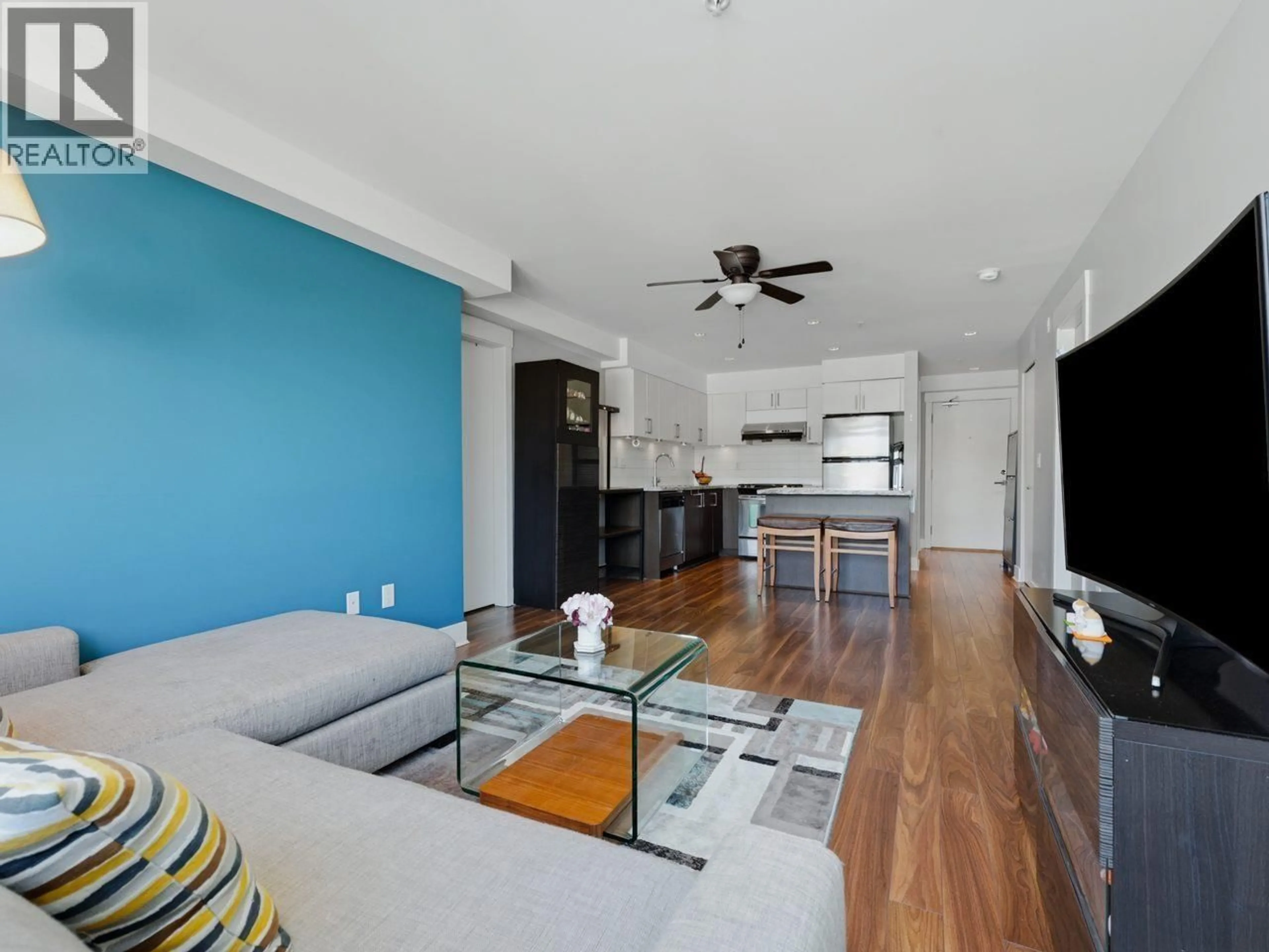 Living room with furniture, wood/laminate floor for 308 - 85 EIGHTH AVENUE, New Westminster British Columbia V3L0E9