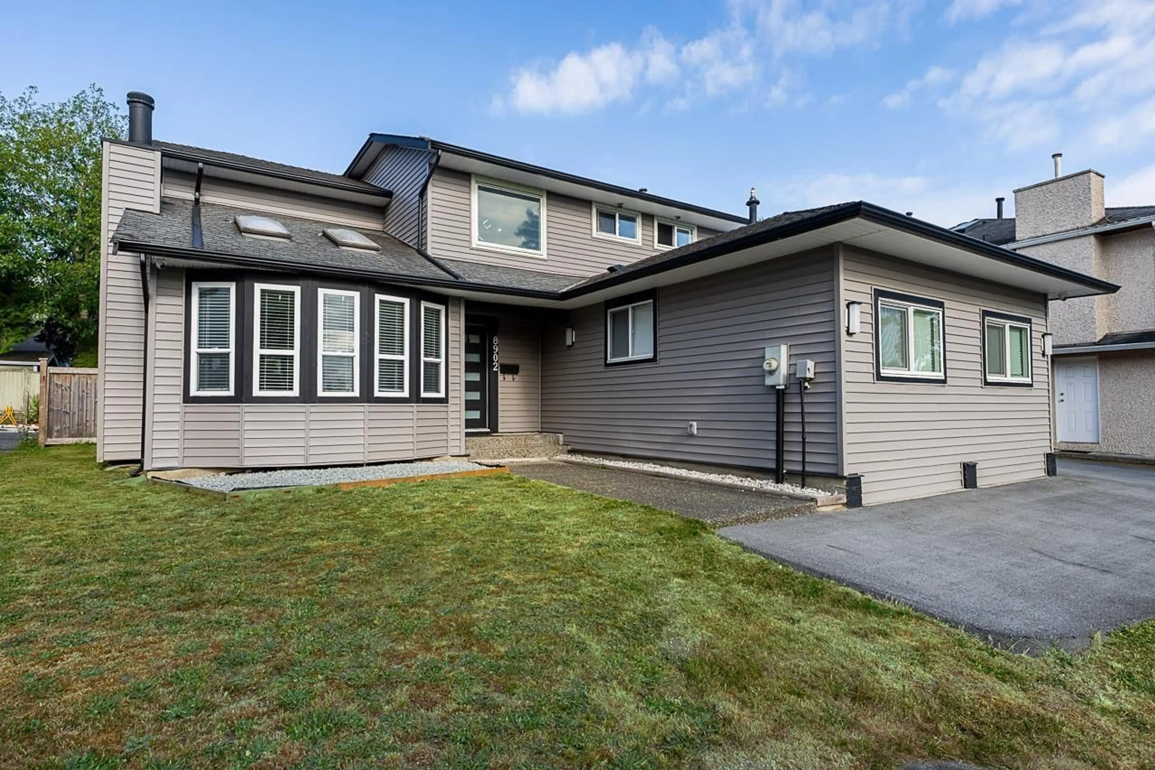 Home with vinyl exterior material, street for 8902 142A STREET, Surrey British Columbia V3V7T1