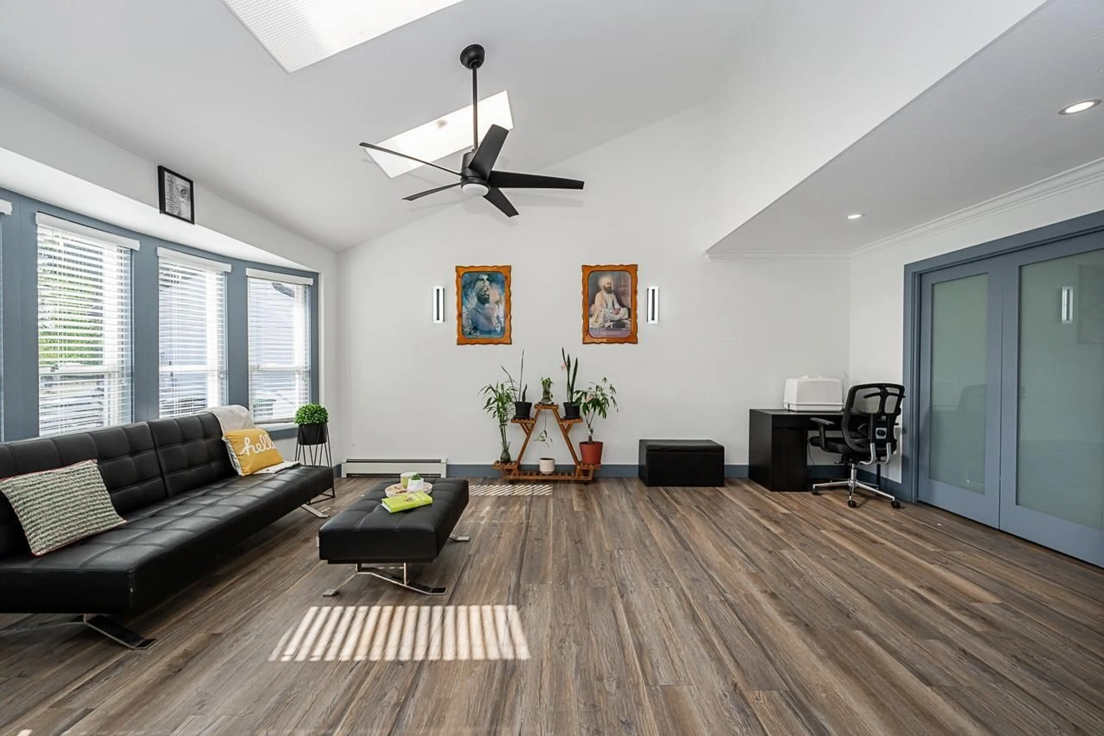 Living room with furniture, wood/laminate floor for 8902 142A STREET, Surrey British Columbia V3V7T1