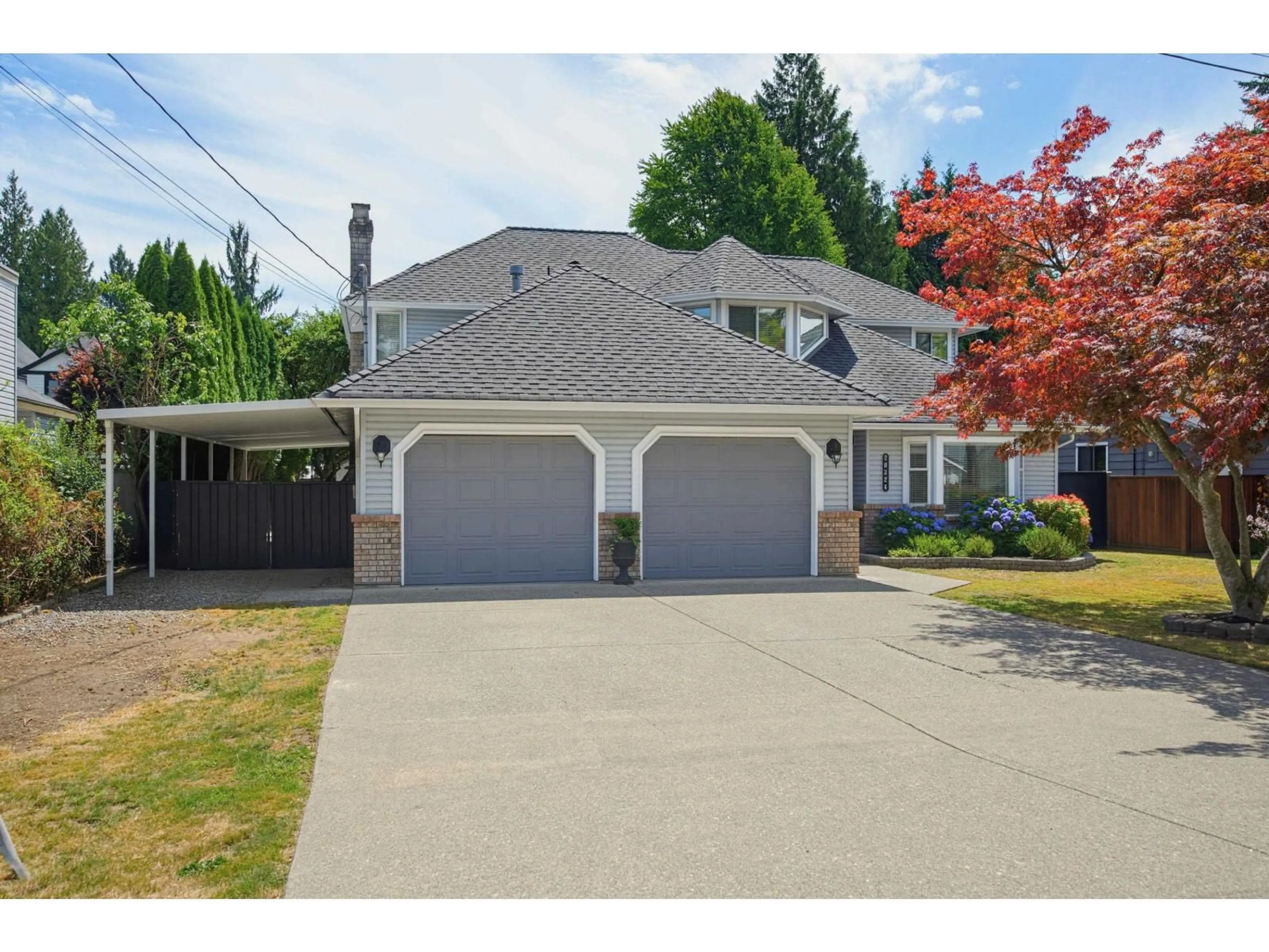Home with vinyl exterior material, street for 20324 94B AVENUE, Langley British Columbia V1M1Y8