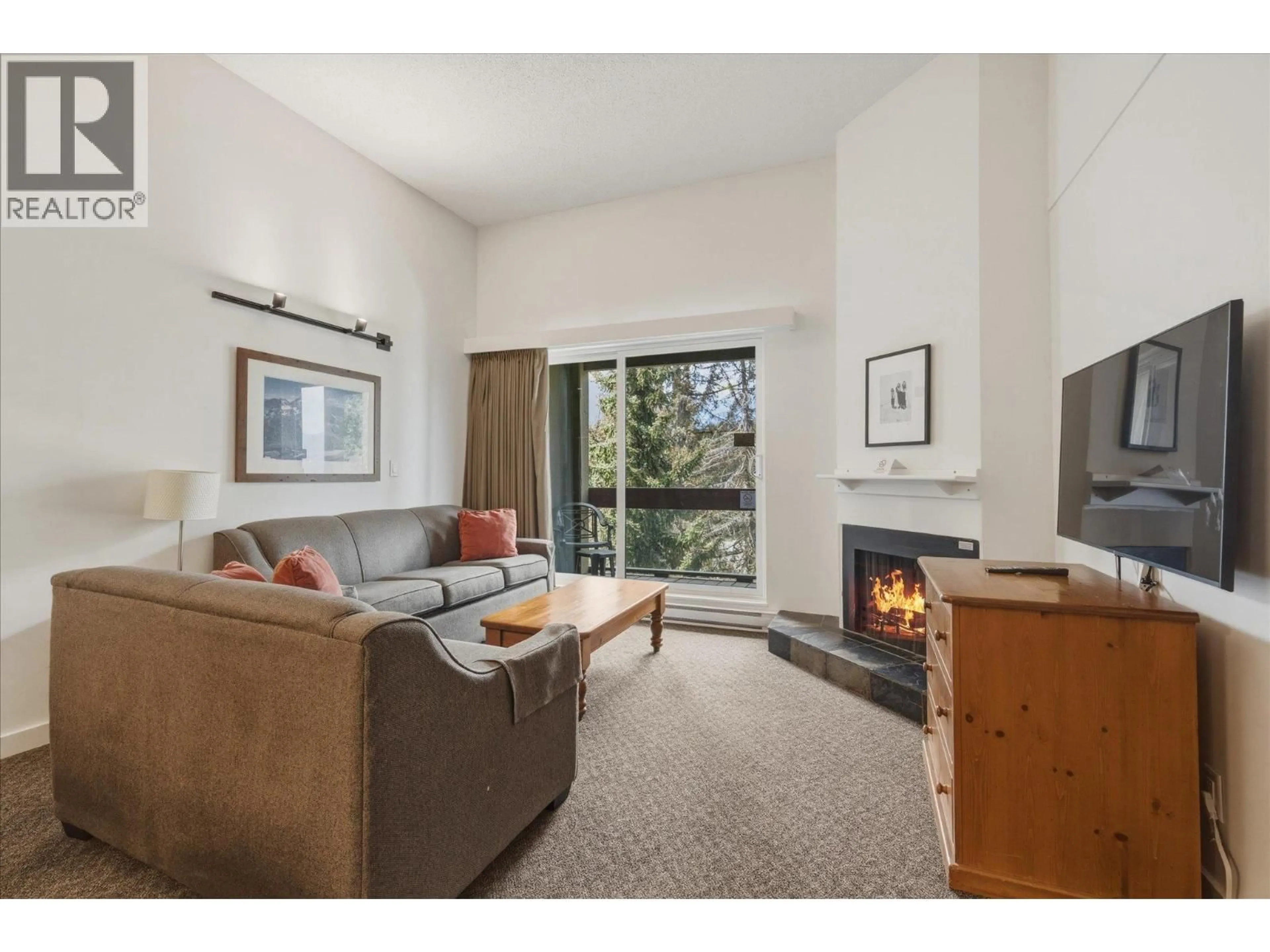 Living room with furniture, unknown for 410 - 4200 WHISTLER WAY, Whistler British Columbia V8E1J4