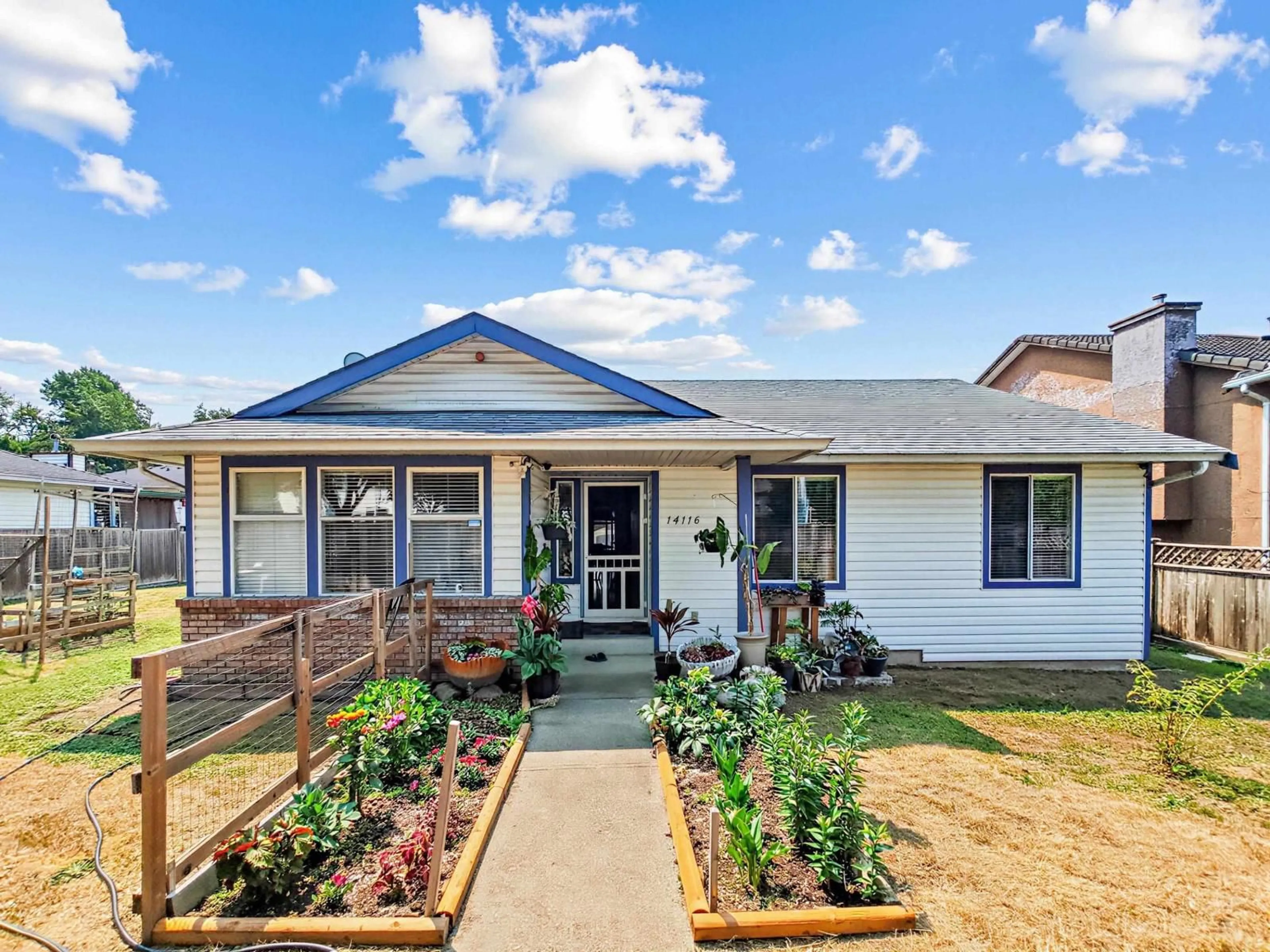 Home with vinyl exterior material, street for 14116 88 AVENUE, Surrey British Columbia V3W3L6