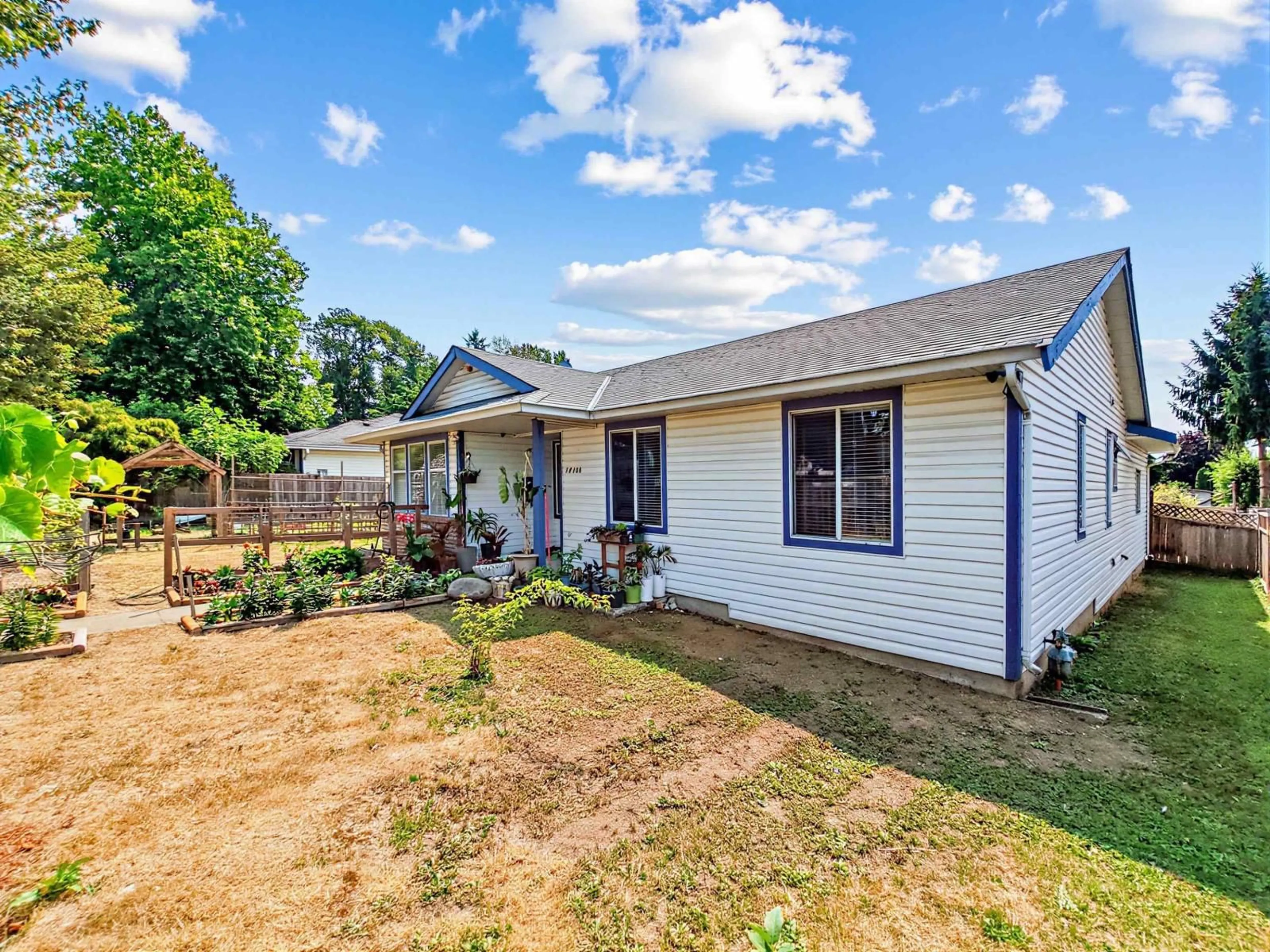A pic from outside/outdoor area/front of a property/back of a property/a pic from drone, street for 14116 88 AVENUE, Surrey British Columbia V3W3L6