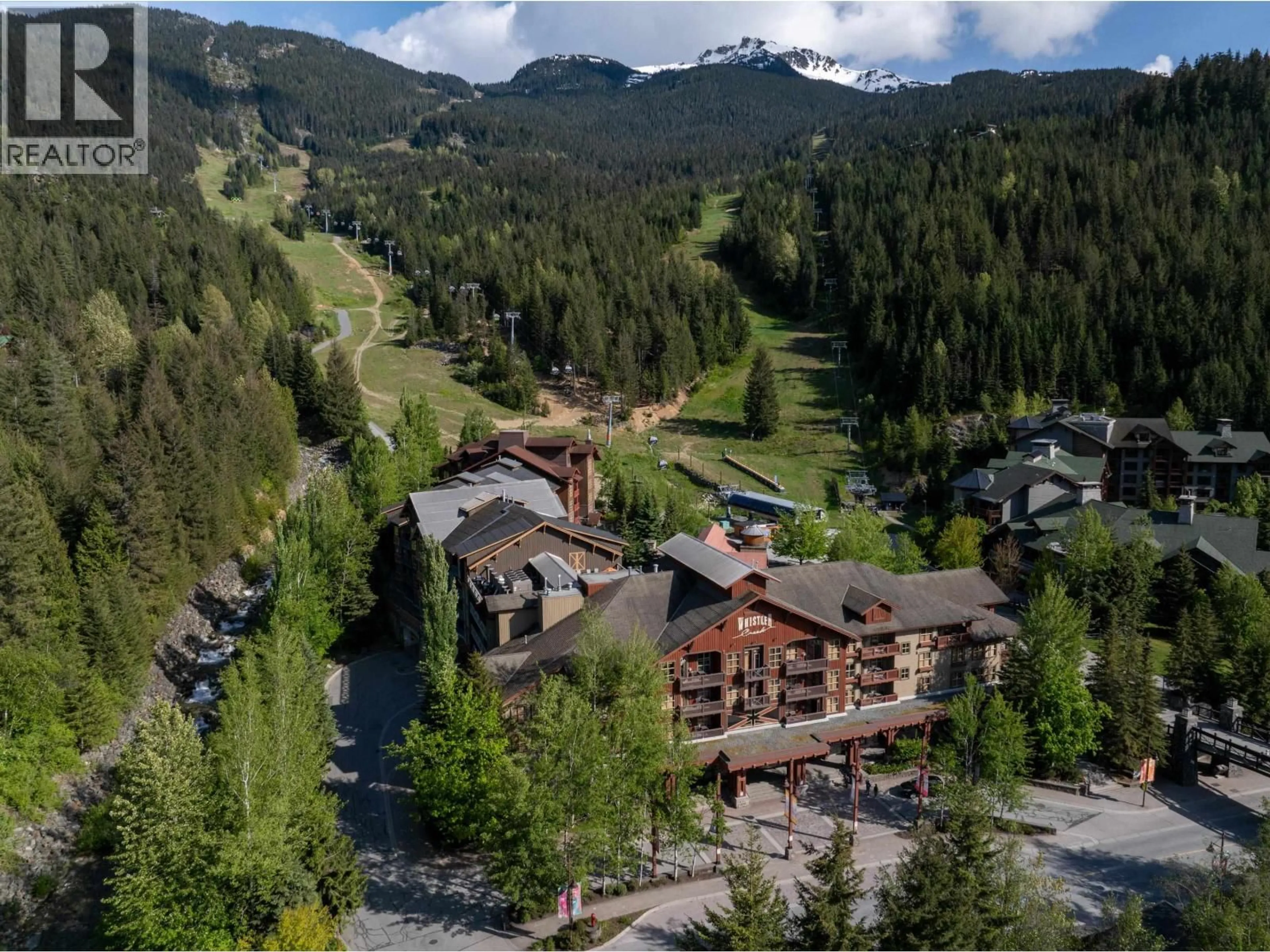 A pic from outside/outdoor area/front of a property/back of a property/a pic from drone, mountain view for 230B - 2036 LONDON LANE, Whistler British Columbia V8E0N7