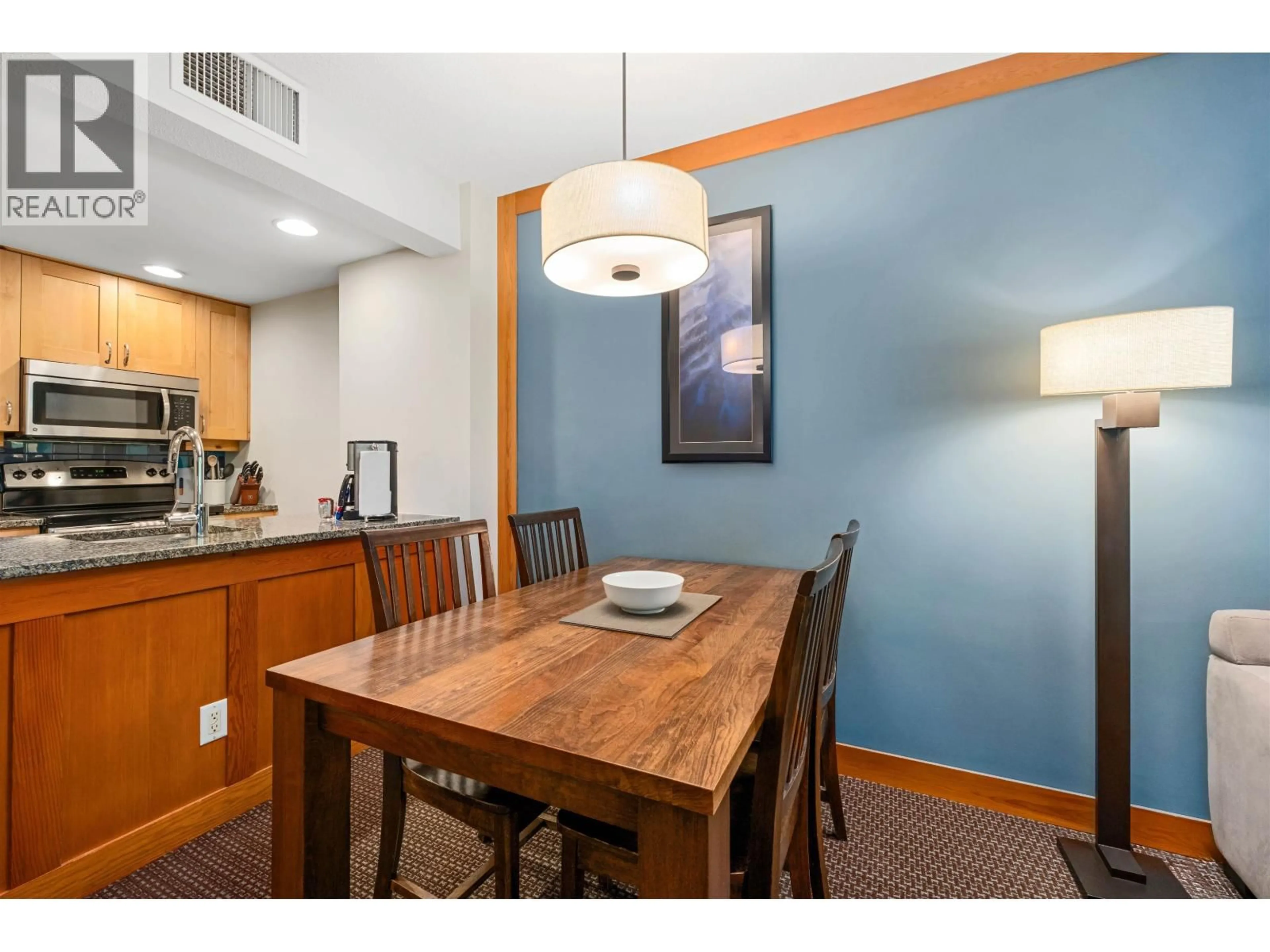 Dining room, wood/laminate floor for 230B - 2036 LONDON LANE, Whistler British Columbia V8E0N7