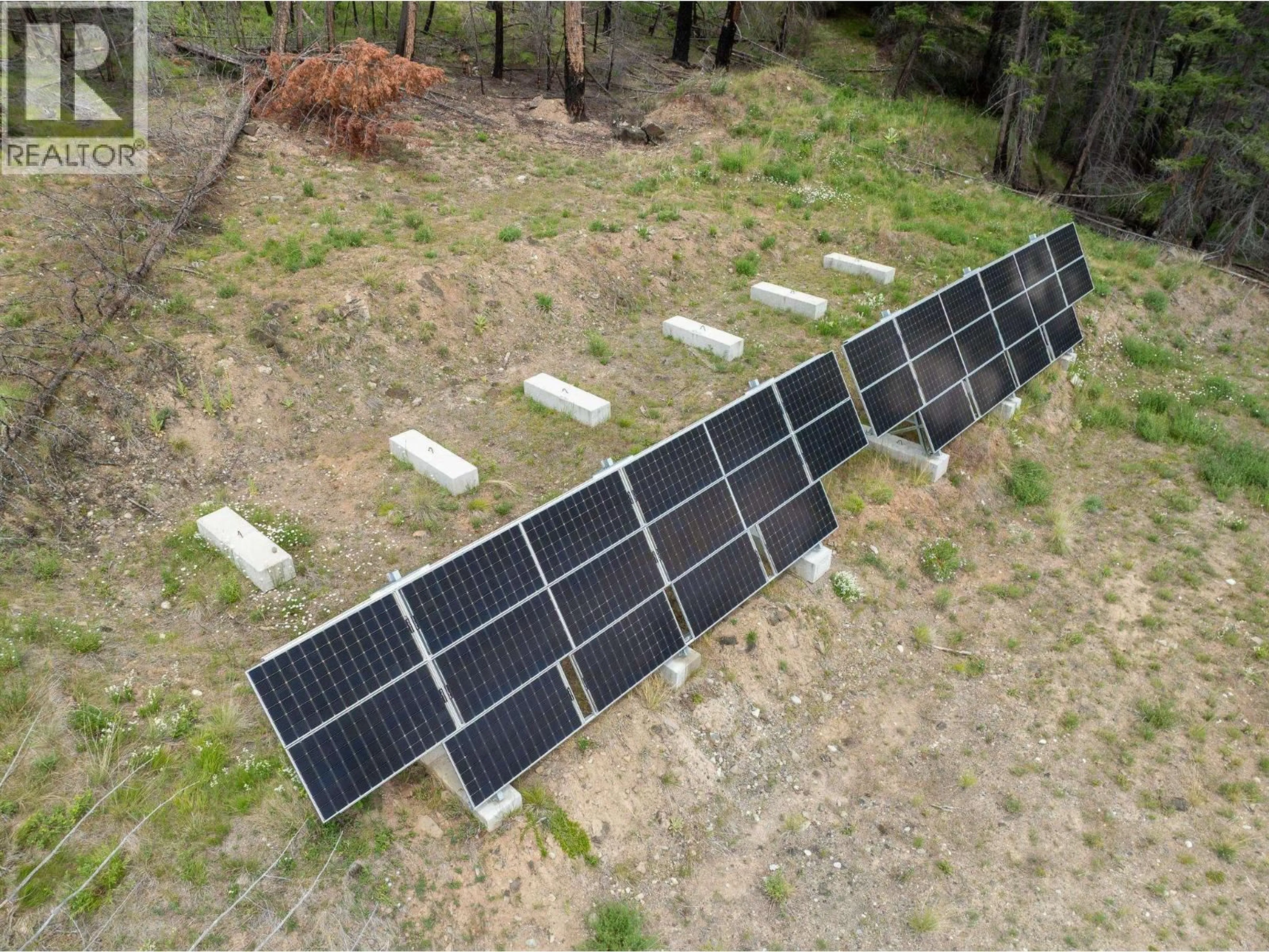 A pic from outside/outdoor area/front of a property/back of a property/a pic from drone, building for 6425 BOULE YOUNG LAKE ROAD, 70 Mile House British Columbia V0K2K2