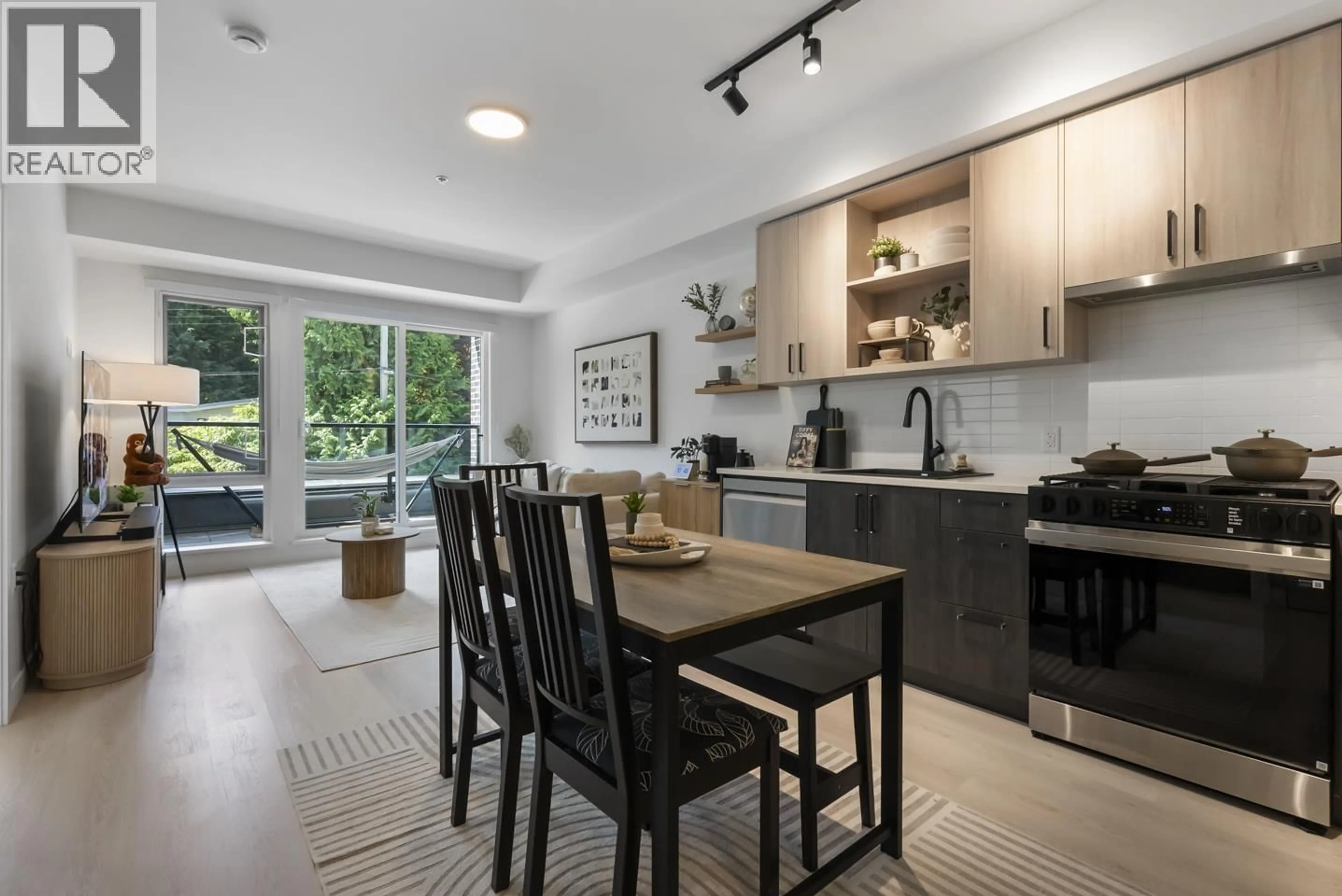 Open concept kitchen, ceramic/tile floor for 213 - 2002 ST. GEORGE STREET, Port Moody British Columbia V3H0N4