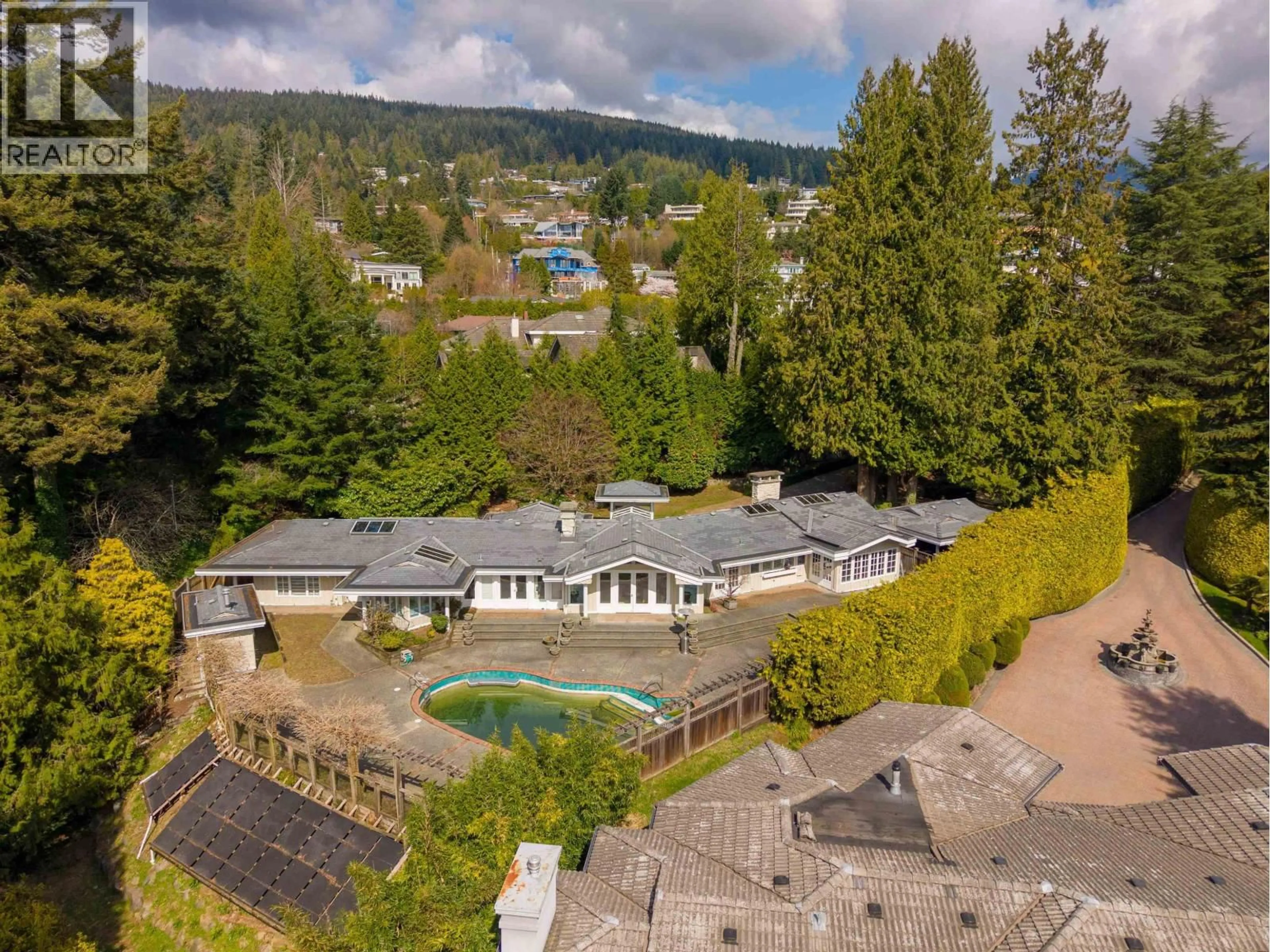 A pic from outside/outdoor area/front of a property/back of a property/a pic from drone, mountain view for 888 PYRFORD ROAD, West Vancouver British Columbia V7S2A1