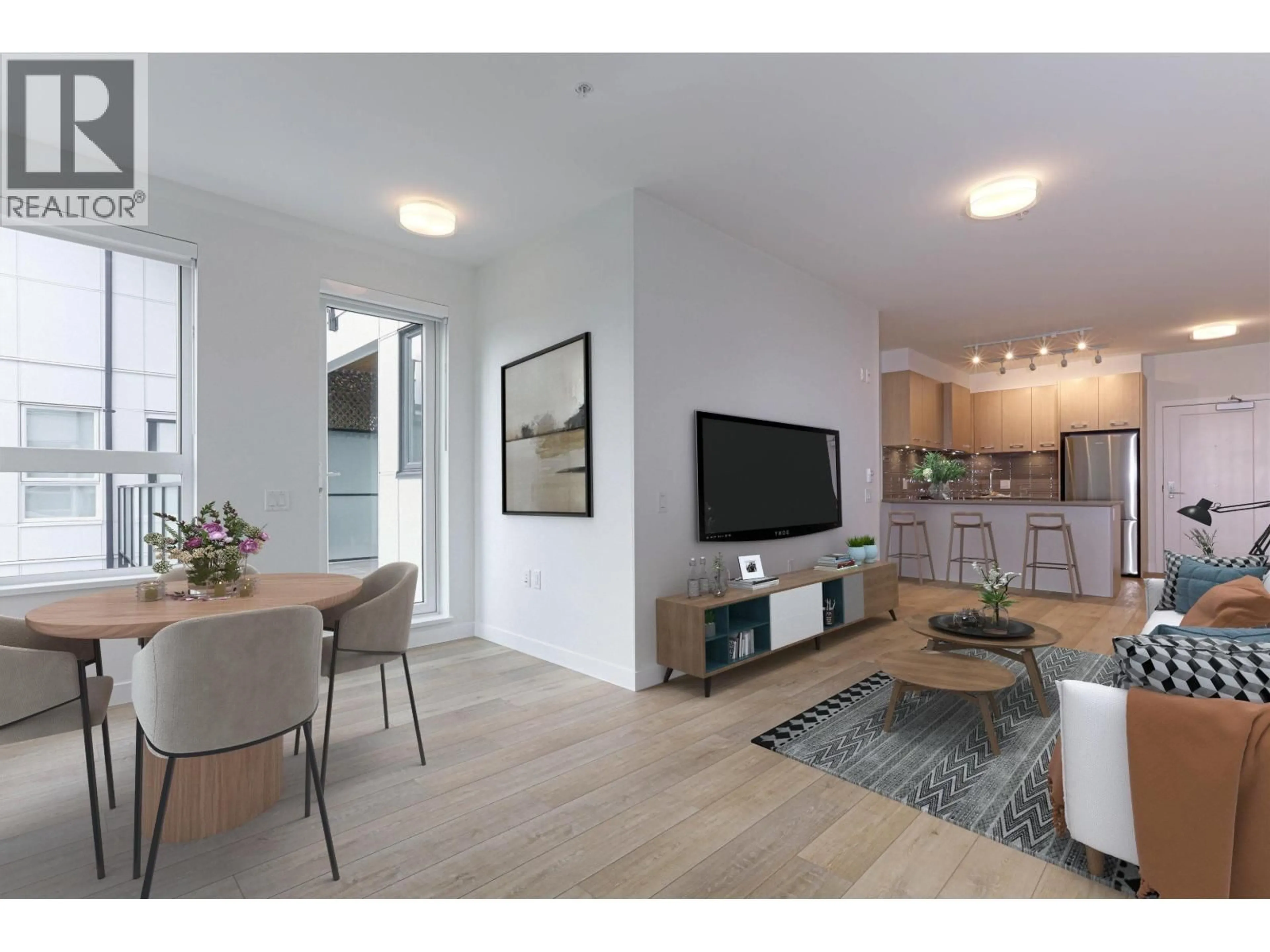 Living room with furniture, wood/laminate floor for 403 - 4933 CLARENDON STREET, Vancouver British Columbia V5R3J3