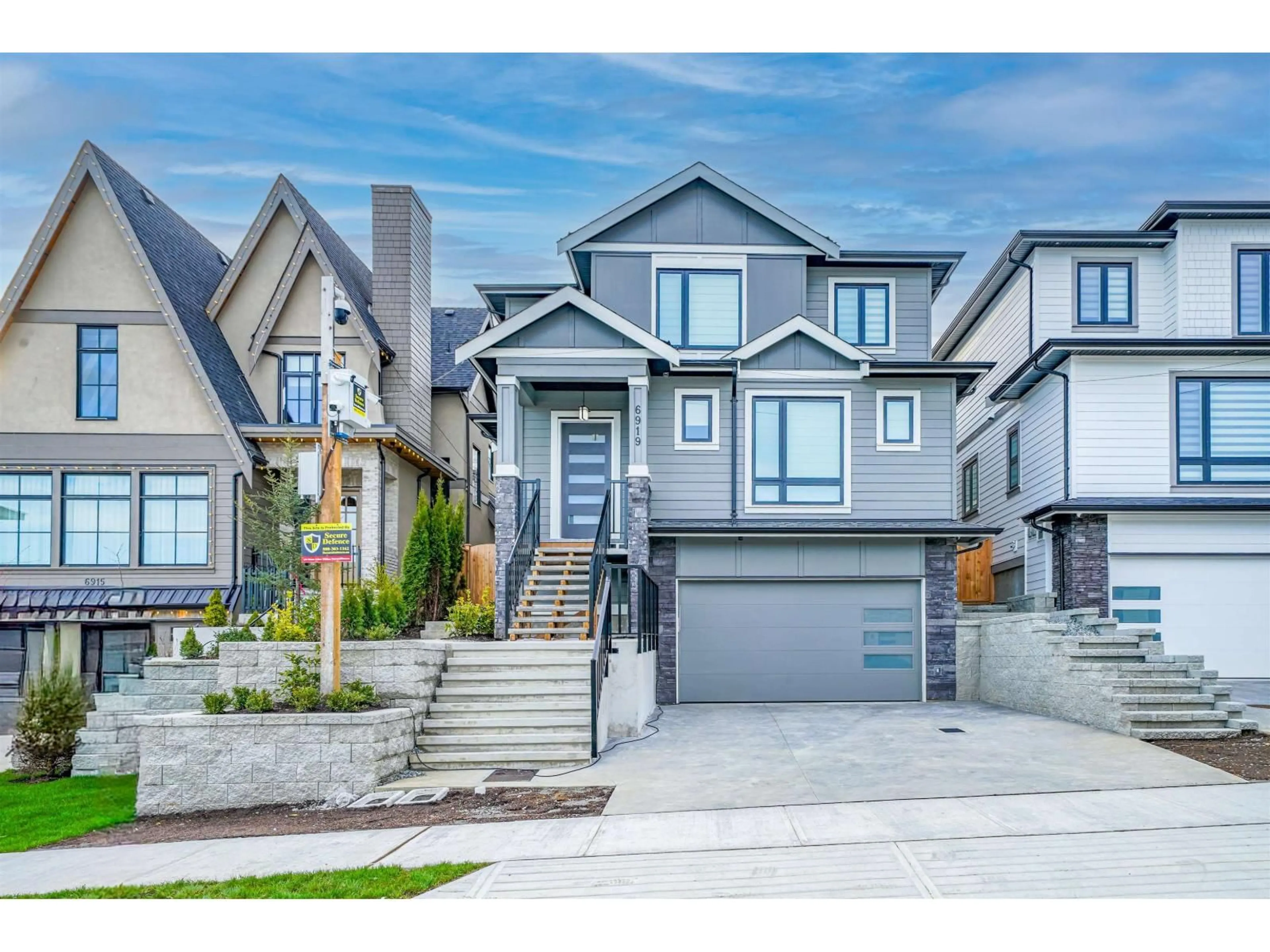 Home with vinyl exterior material, street for 6923 205 STREET, Langley British Columbia V2Y1R2