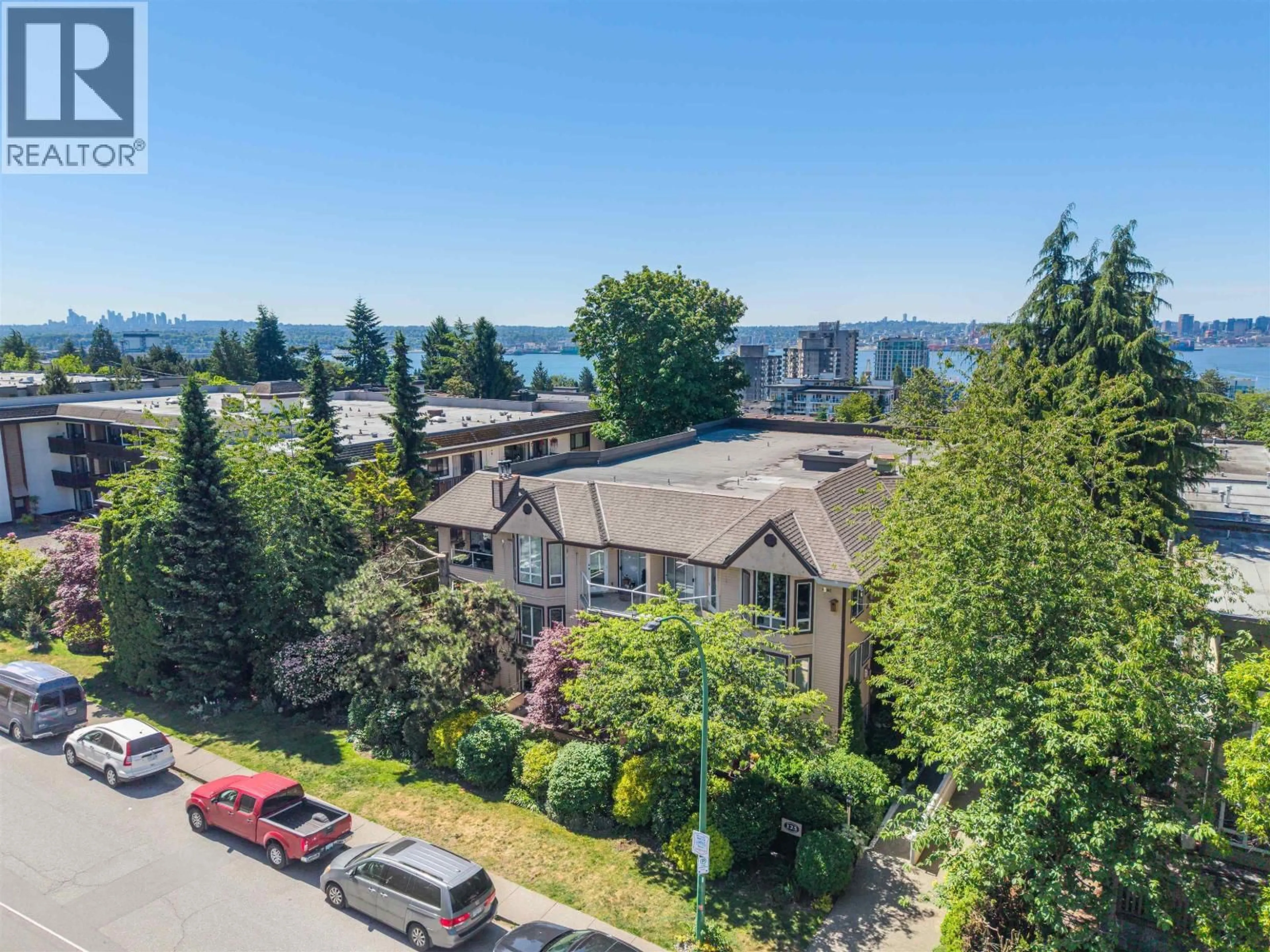 A pic from outside/outdoor area/front of a property/back of a property/a pic from drone, water/lake/river/ocean view for 102 - 123 6TH STREET, North Vancouver British Columbia V7L1N9