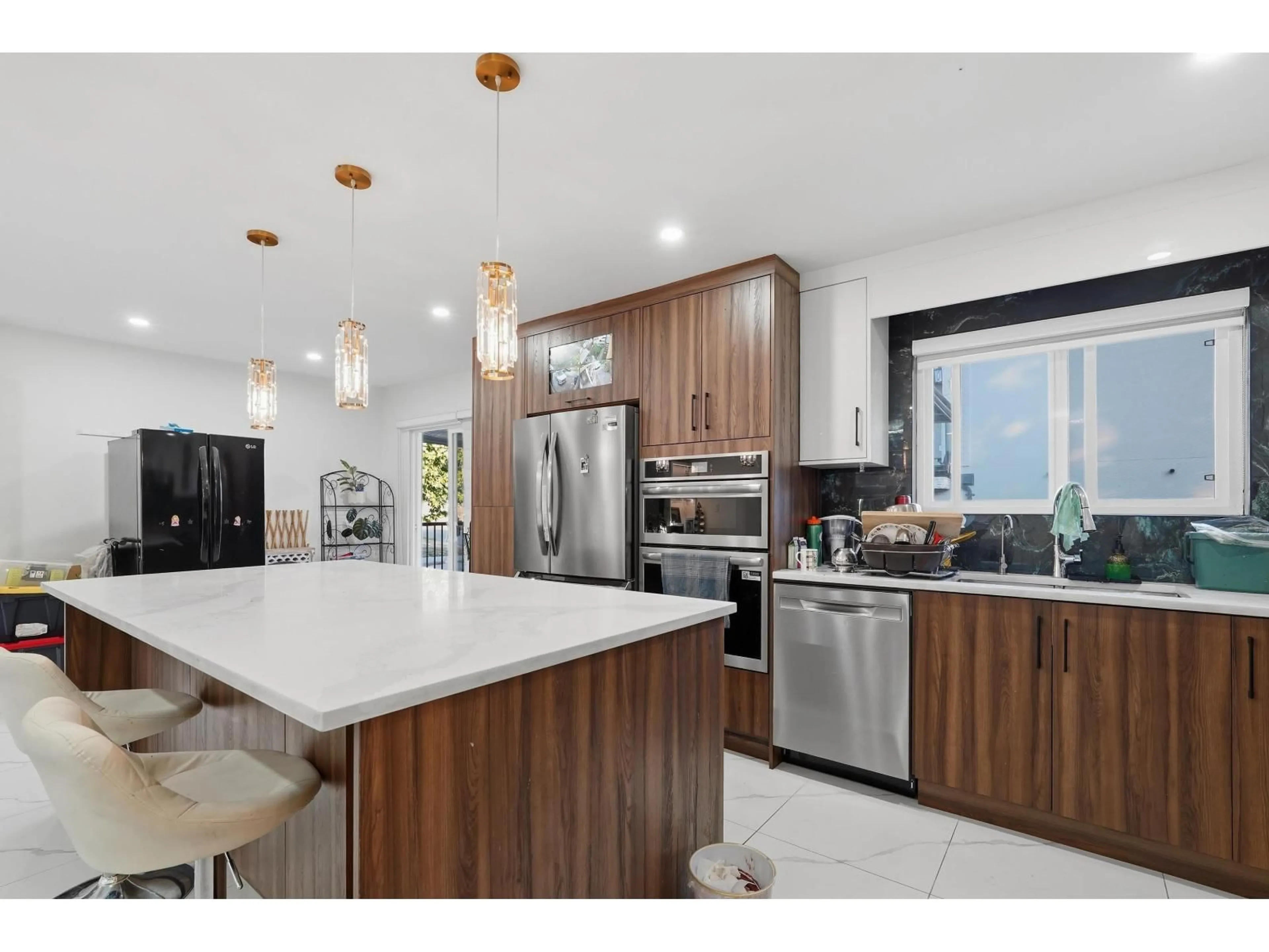 Open concept kitchen, unknown for 17886 59A AVENUE, Surrey British Columbia V3S1R1