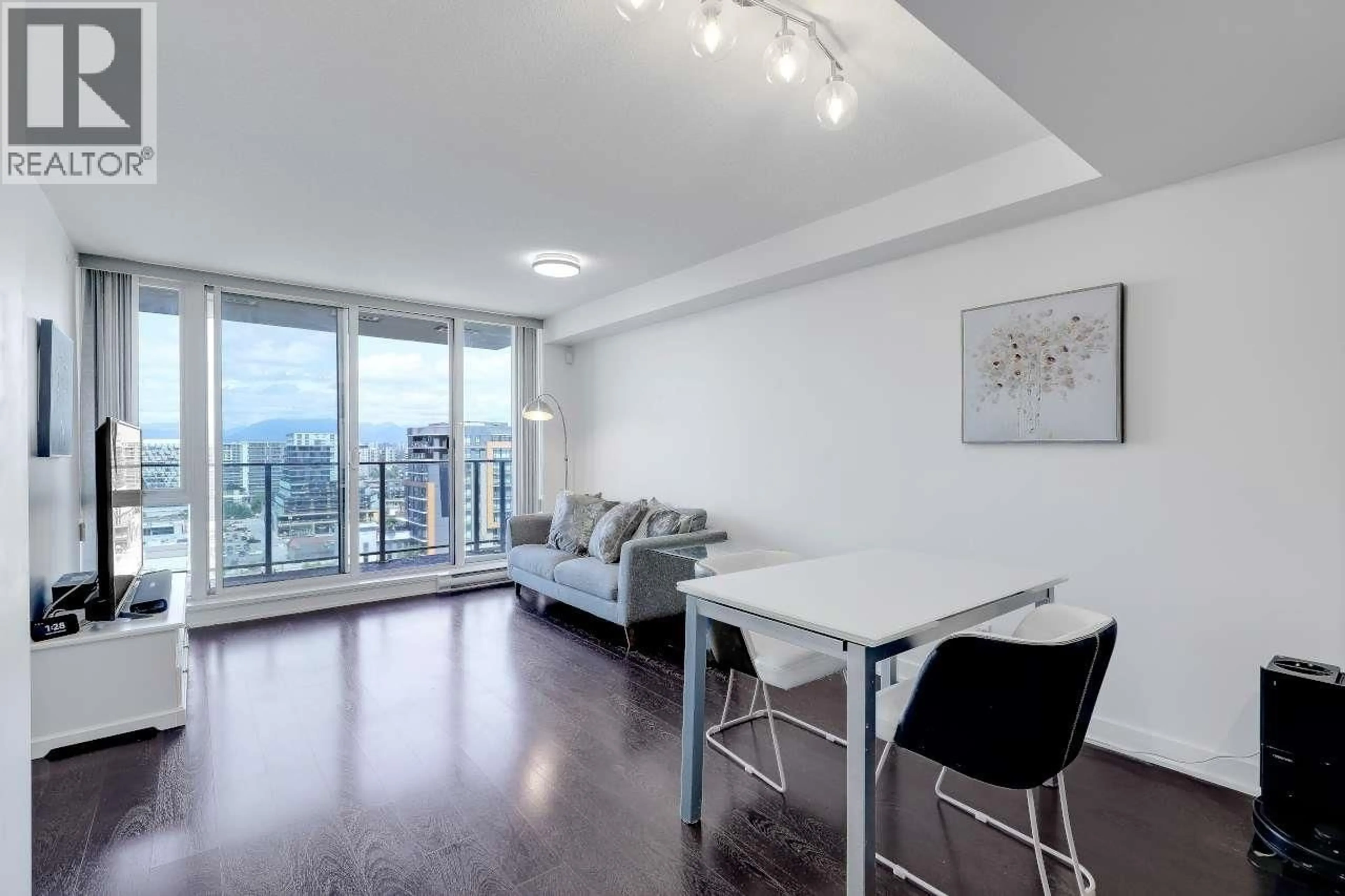 Living room with furniture, wood/laminate floor for 1602 - 7080 NO. 3 ROAD, Richmond British Columbia V6Y0B5