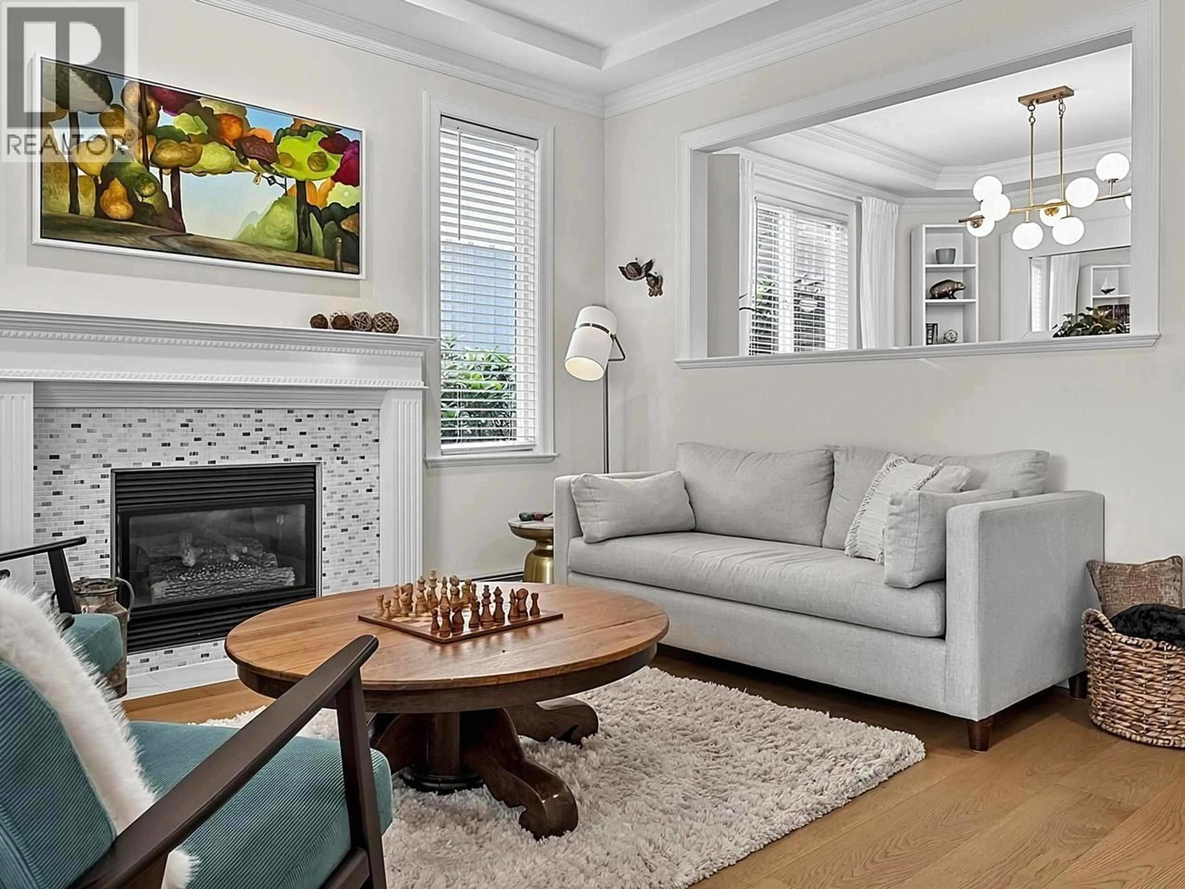 Living room with furniture, wood/laminate floor for 1074 KILMER ROAD, North Vancouver British Columbia V7K1R1