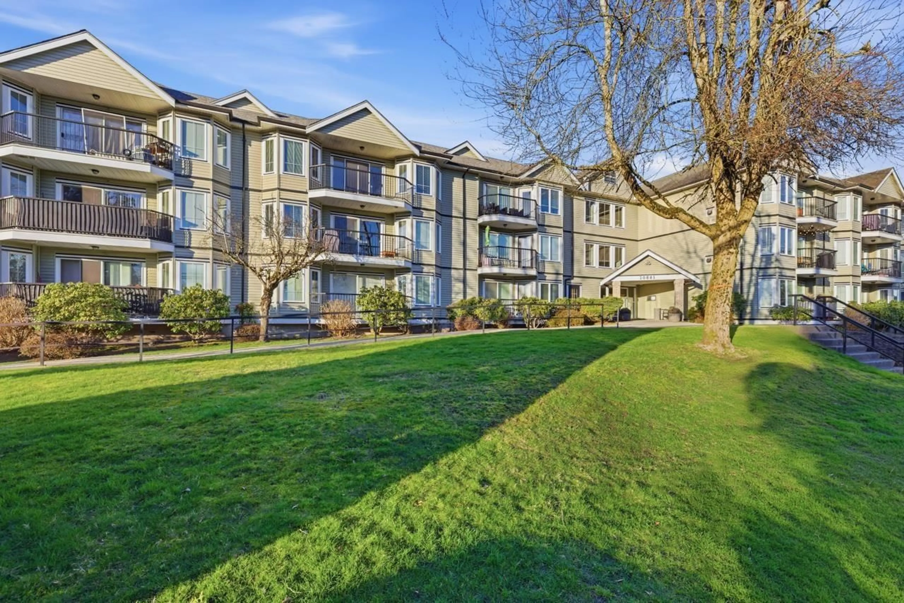 A pic from outside/outdoor area/front of a property/back of a property/a pic from drone, unknown for 102 - 20881 56 AVENUE, Langley British Columbia V3A3Z3