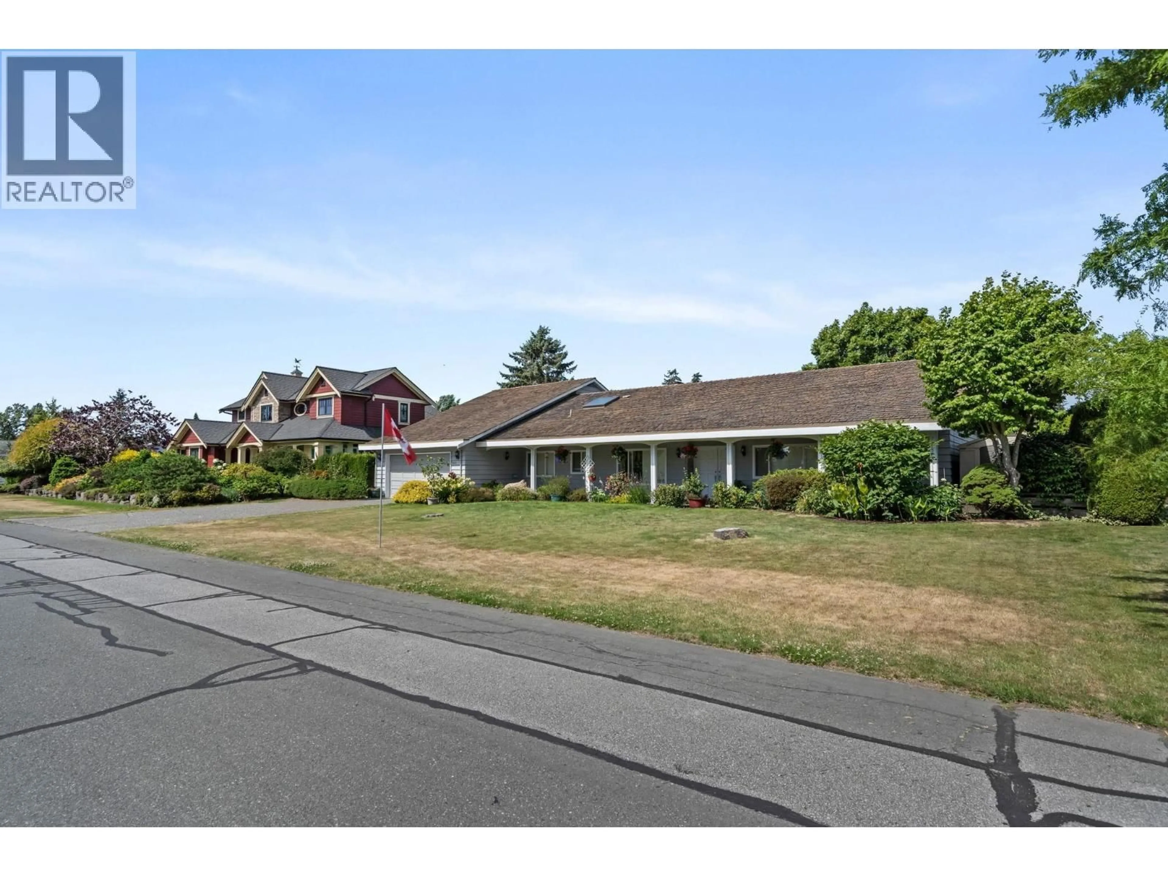 A pic from outside/outdoor area/front of a property/back of a property/a pic from drone, street for 901 JACKSON WAY, Delta British Columbia V4L1W5