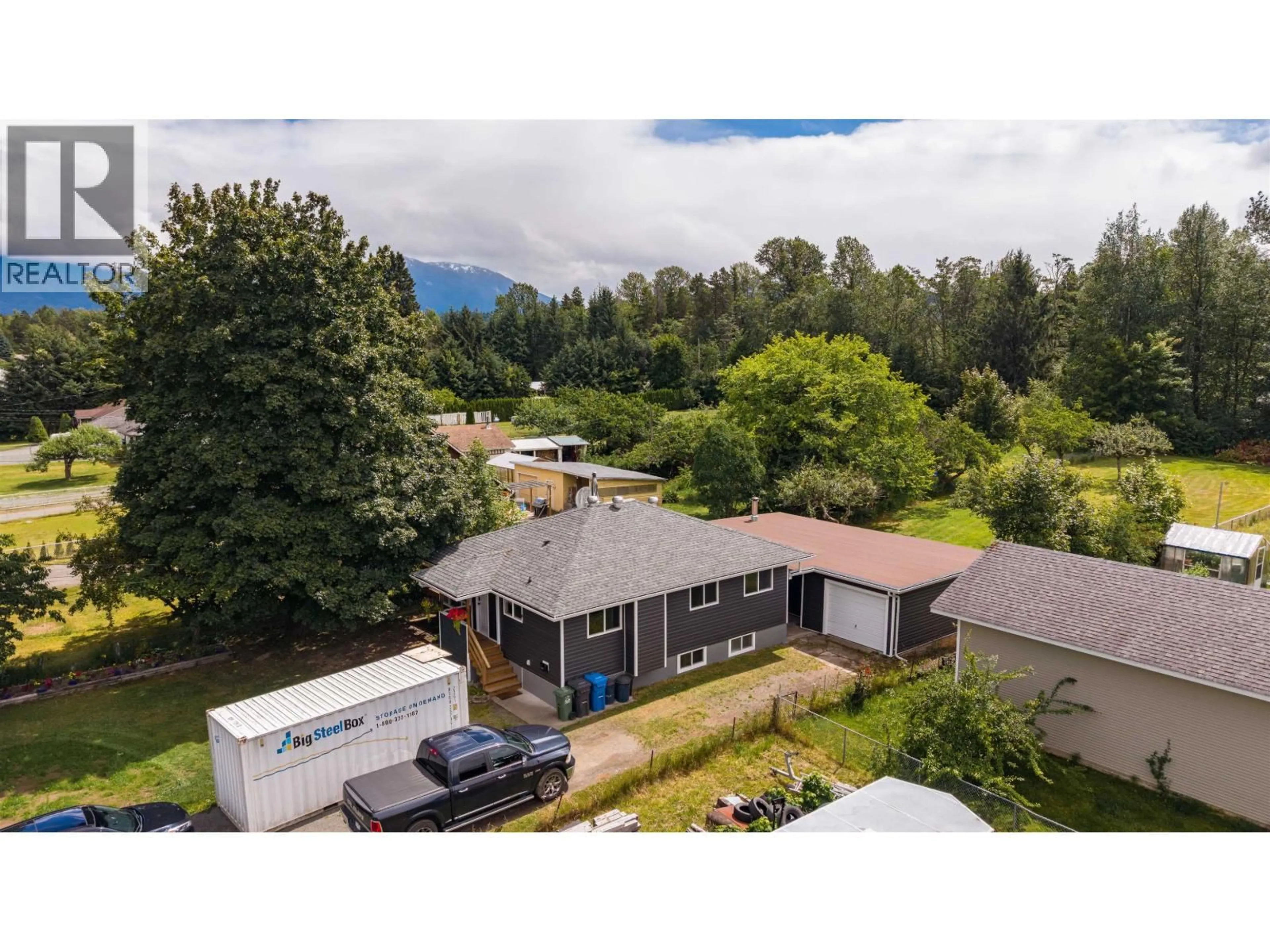 A pic from outside/outdoor area/front of a property/back of a property/a pic from drone, mountain view for 4931 MEDEEK AVENUE, Terrace British Columbia V8G1C7