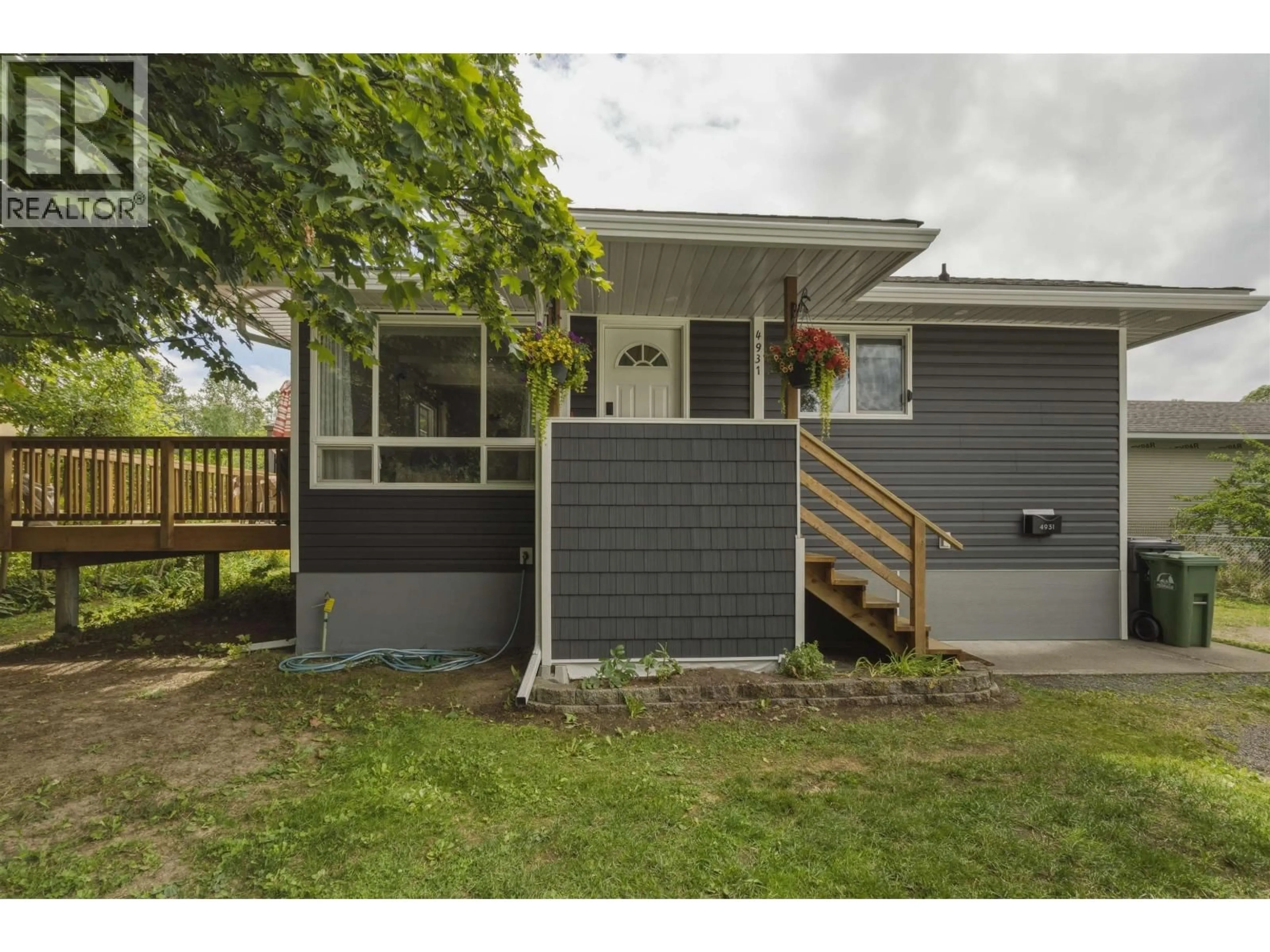 Home with vinyl exterior material, street for 4931 MEDEEK AVENUE, Terrace British Columbia V8G1C7