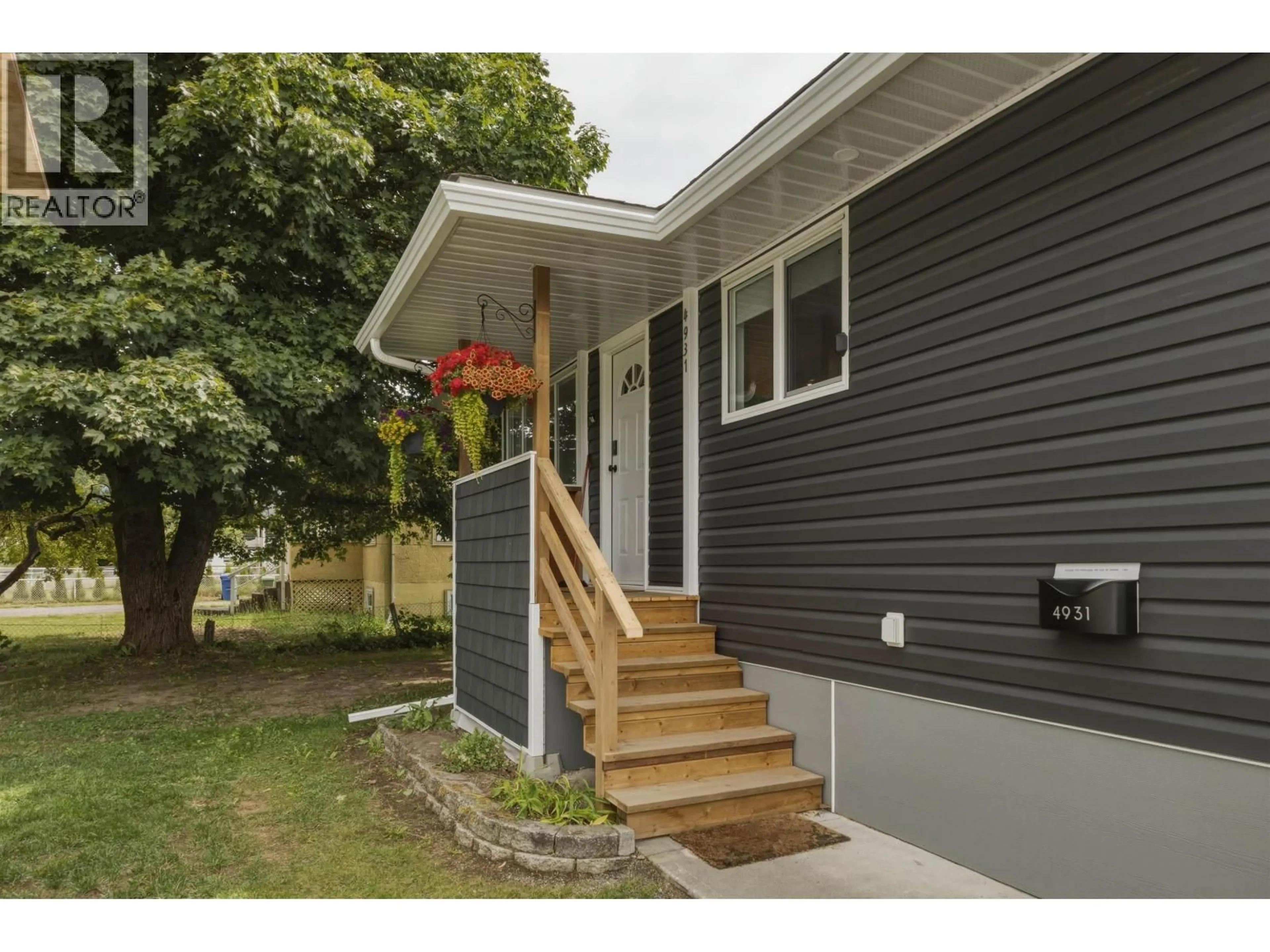 Home with vinyl exterior material, street for 4931 MEDEEK AVENUE, Terrace British Columbia V8G1C7