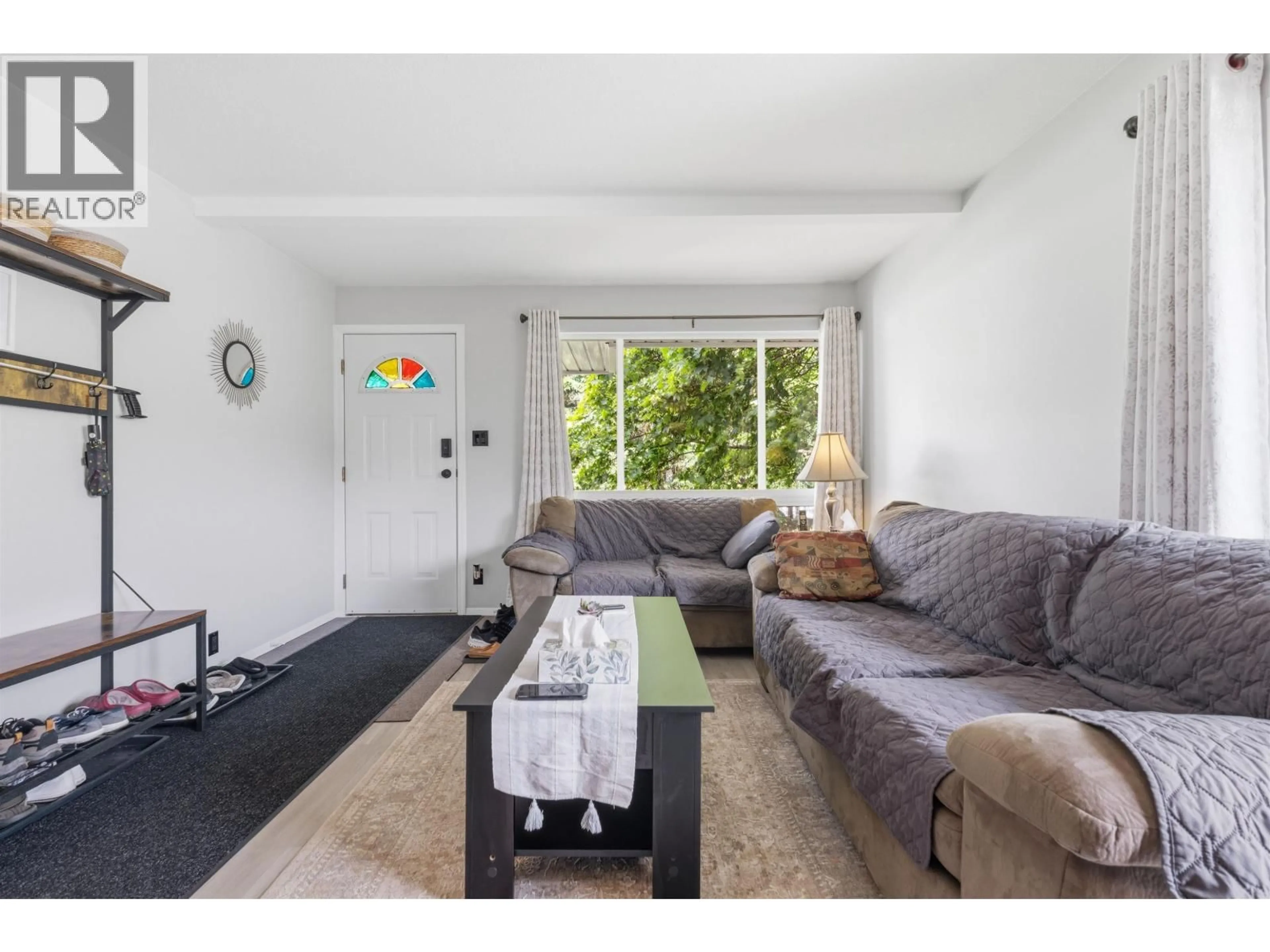Living room with furniture, unknown for 4931 MEDEEK AVENUE, Terrace British Columbia V8G1C7