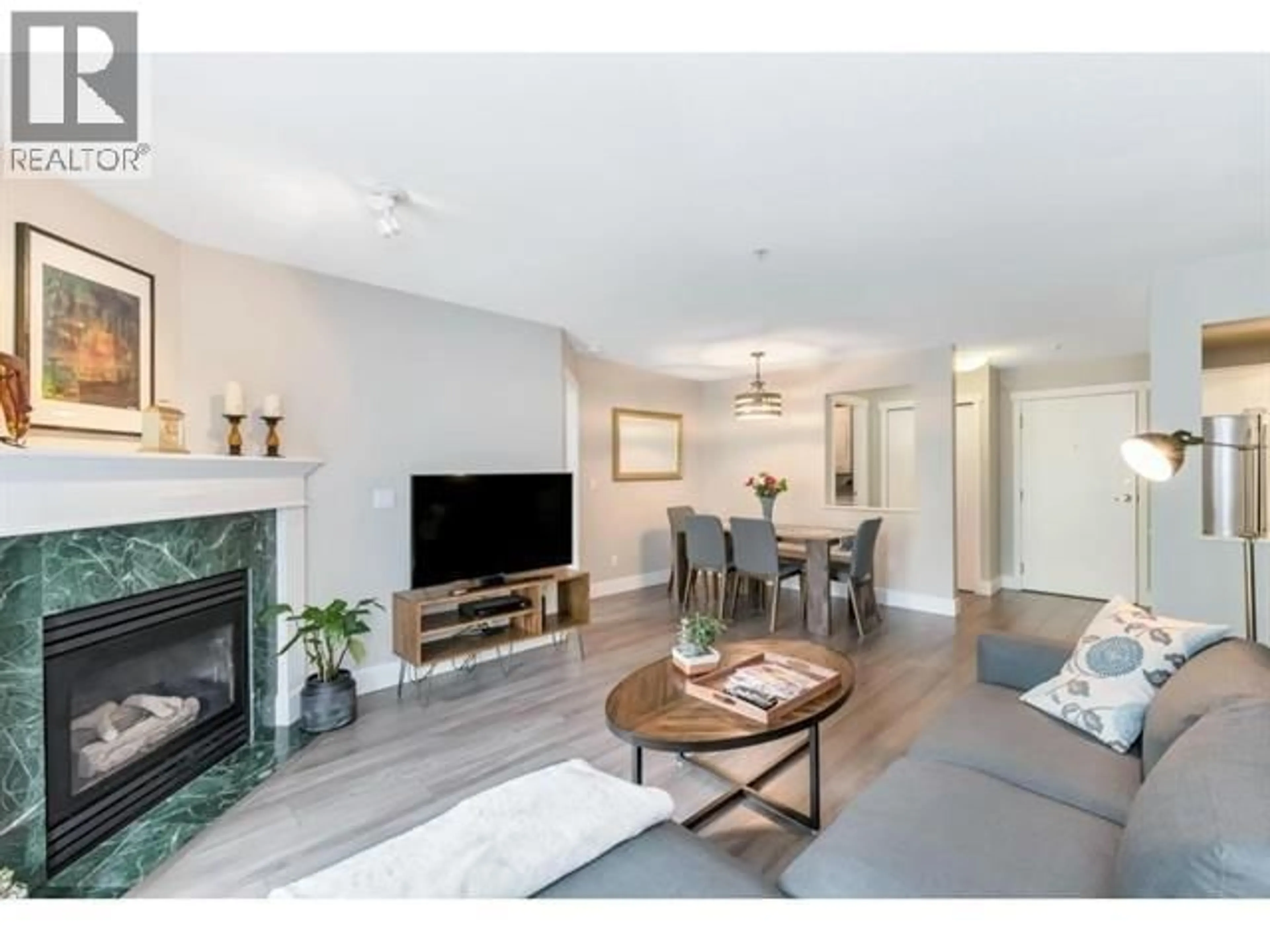 Living room with furniture, wood/laminate floor for 209 - 8080 JONES ROAD, Richmond British Columbia V6Y4A9