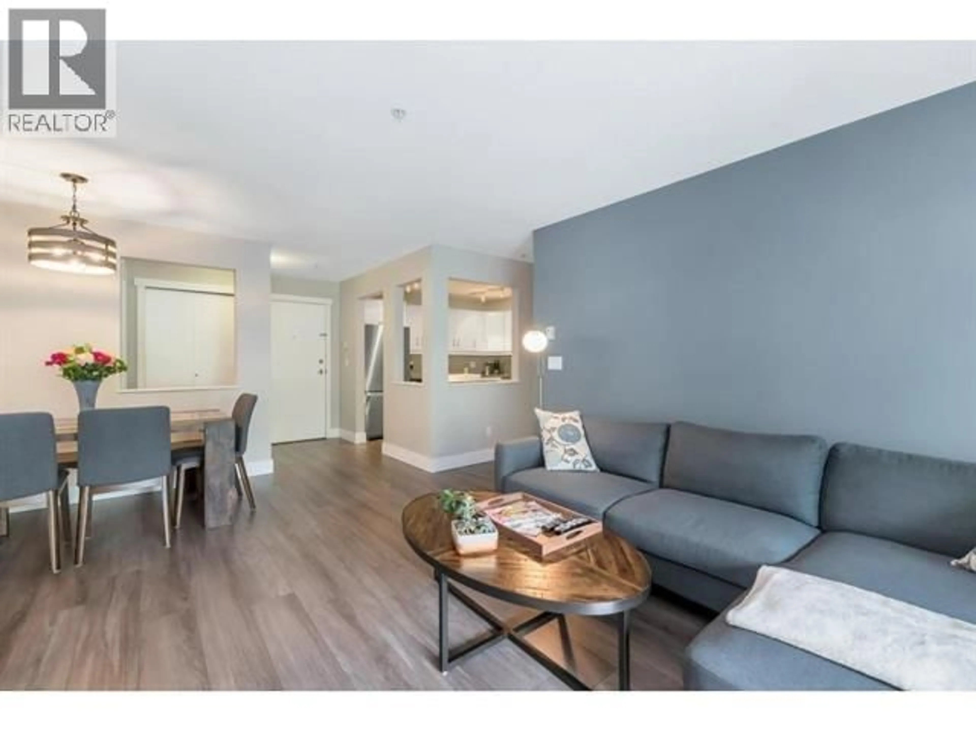 Living room with furniture, wood/laminate floor for 209 - 8080 JONES ROAD, Richmond British Columbia V6Y4A9