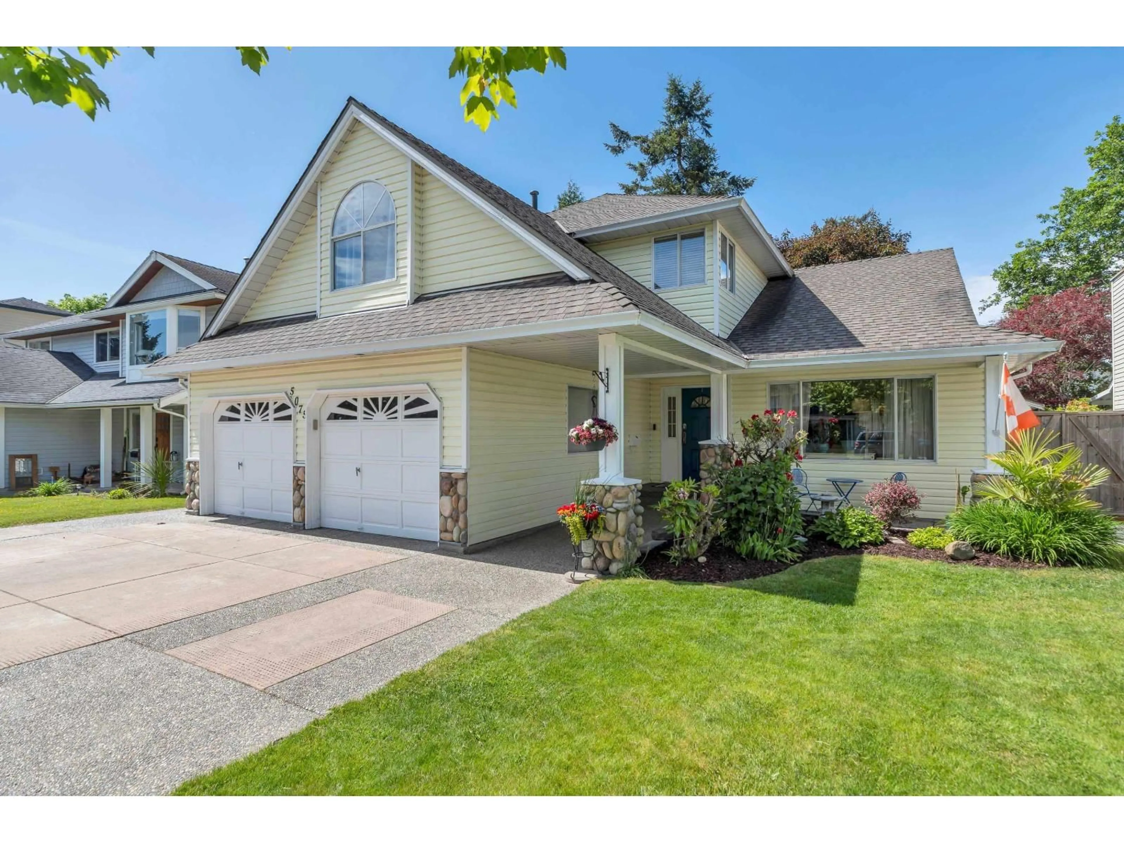 Home with vinyl exterior material, street for 5075 209 STREET, Langley British Columbia V3A7V6