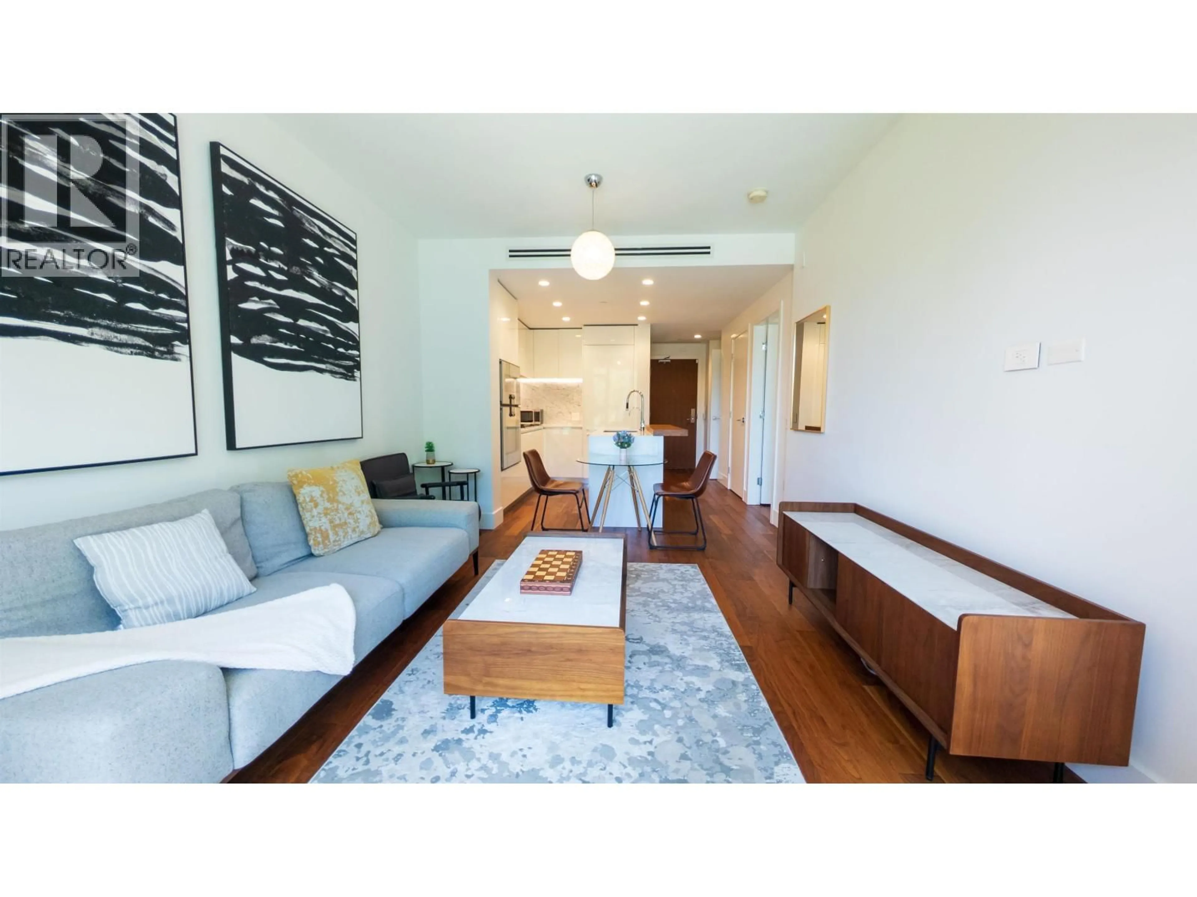 Living room with furniture, wood/laminate floor for 105 - 375 59TH AVENUE, Vancouver British Columbia V5X0J4