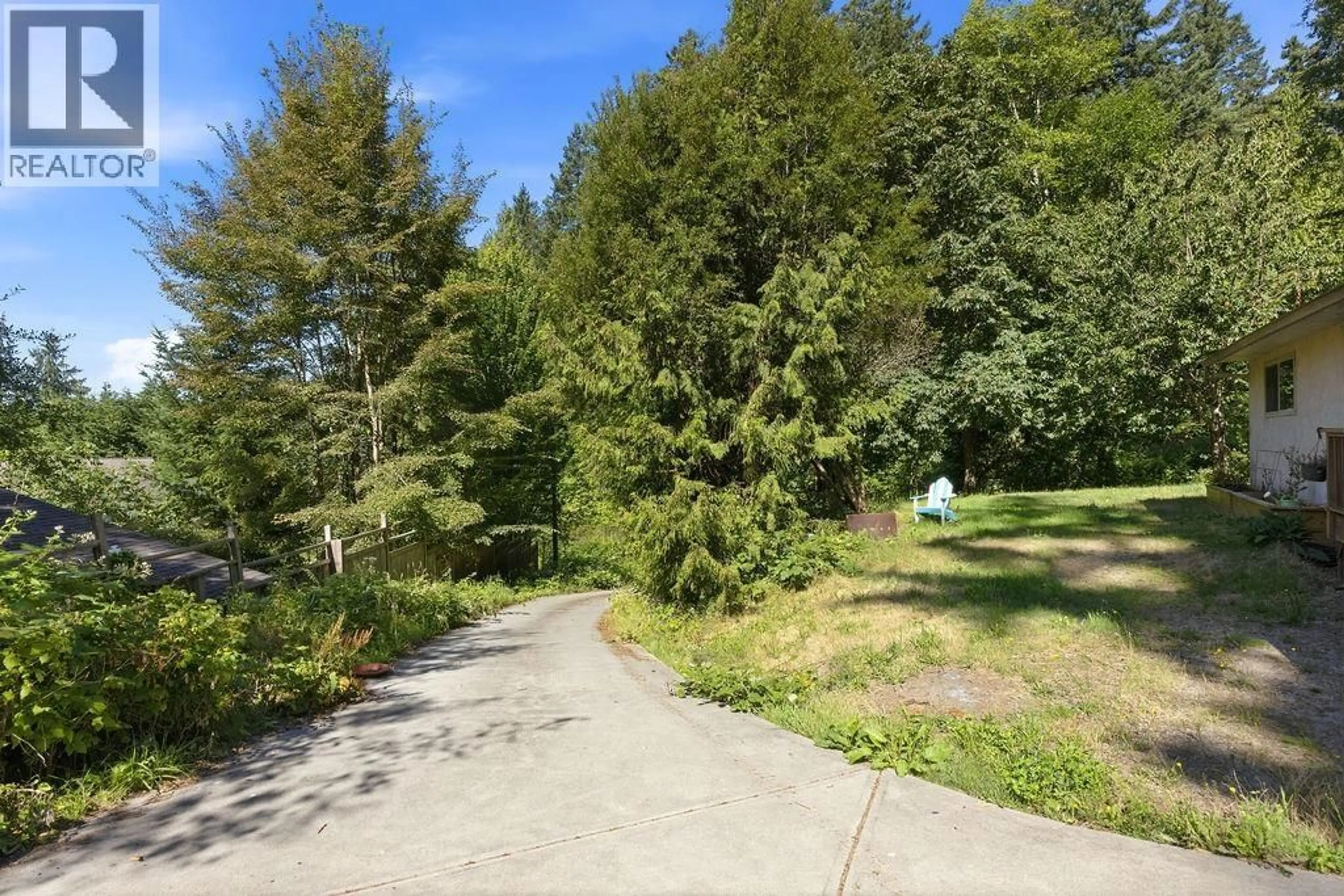 A pic from outside/outdoor area/front of a property/back of a property/a pic from drone, forest/trees view for 5754 TROUT LAKE ROAD, Halfmoon Bay British Columbia V7Z1H1