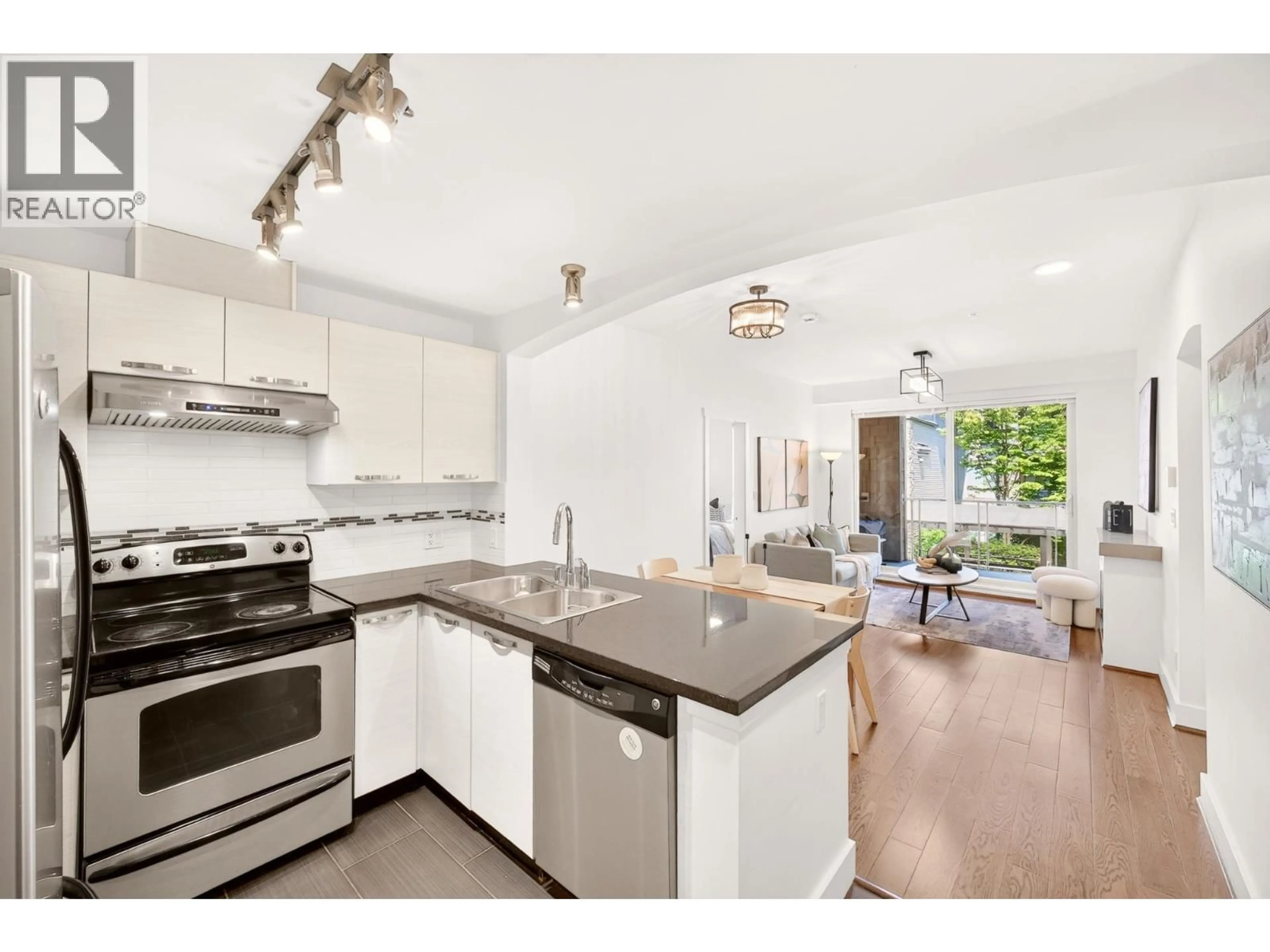Open concept kitchen, unknown for 201 - 7428 BYRNEPARK WALK, Burnaby British Columbia V3N0B4