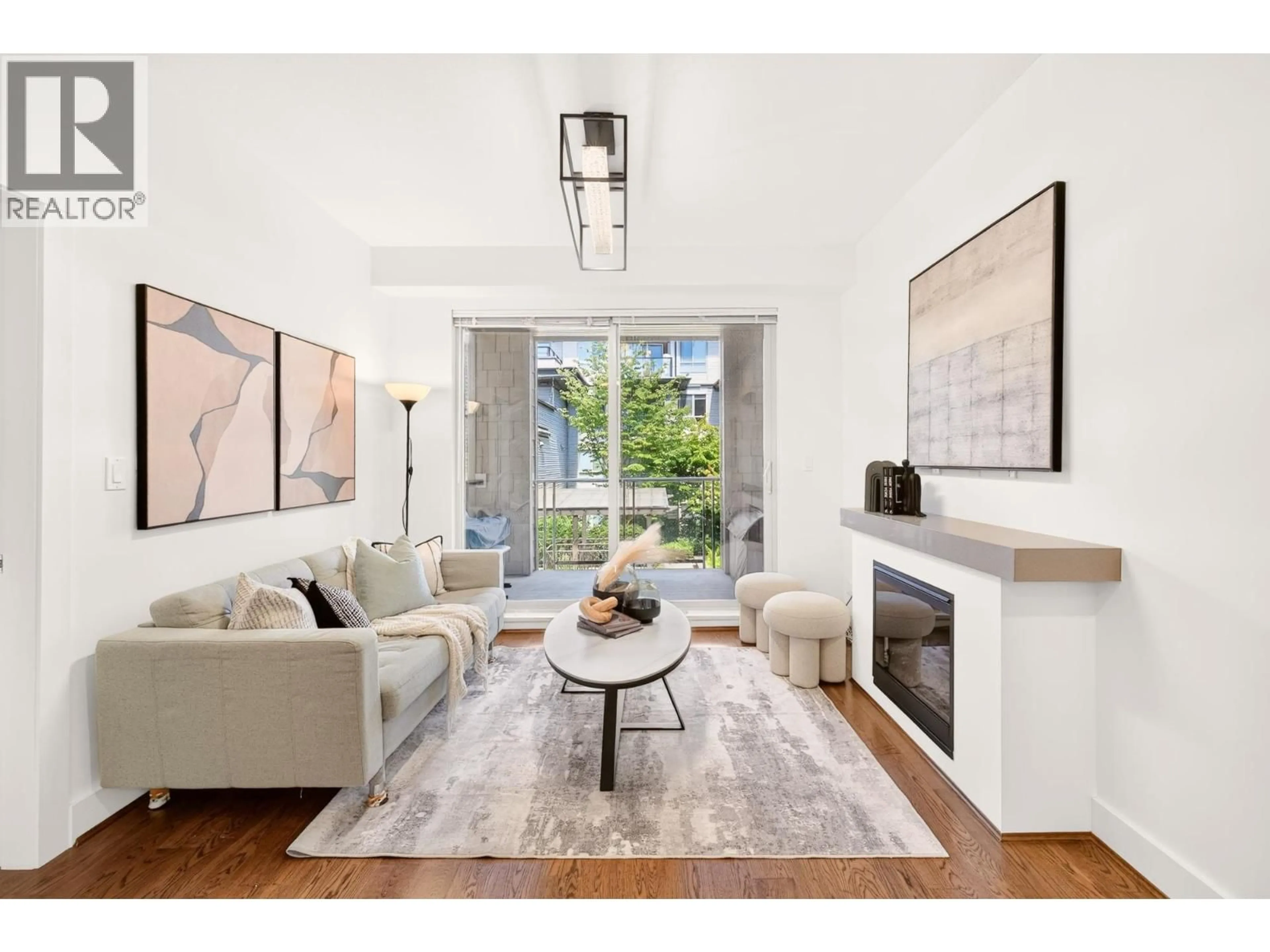 Living room with furniture, unknown for 201 - 7428 BYRNEPARK WALK, Burnaby British Columbia V3N0B4