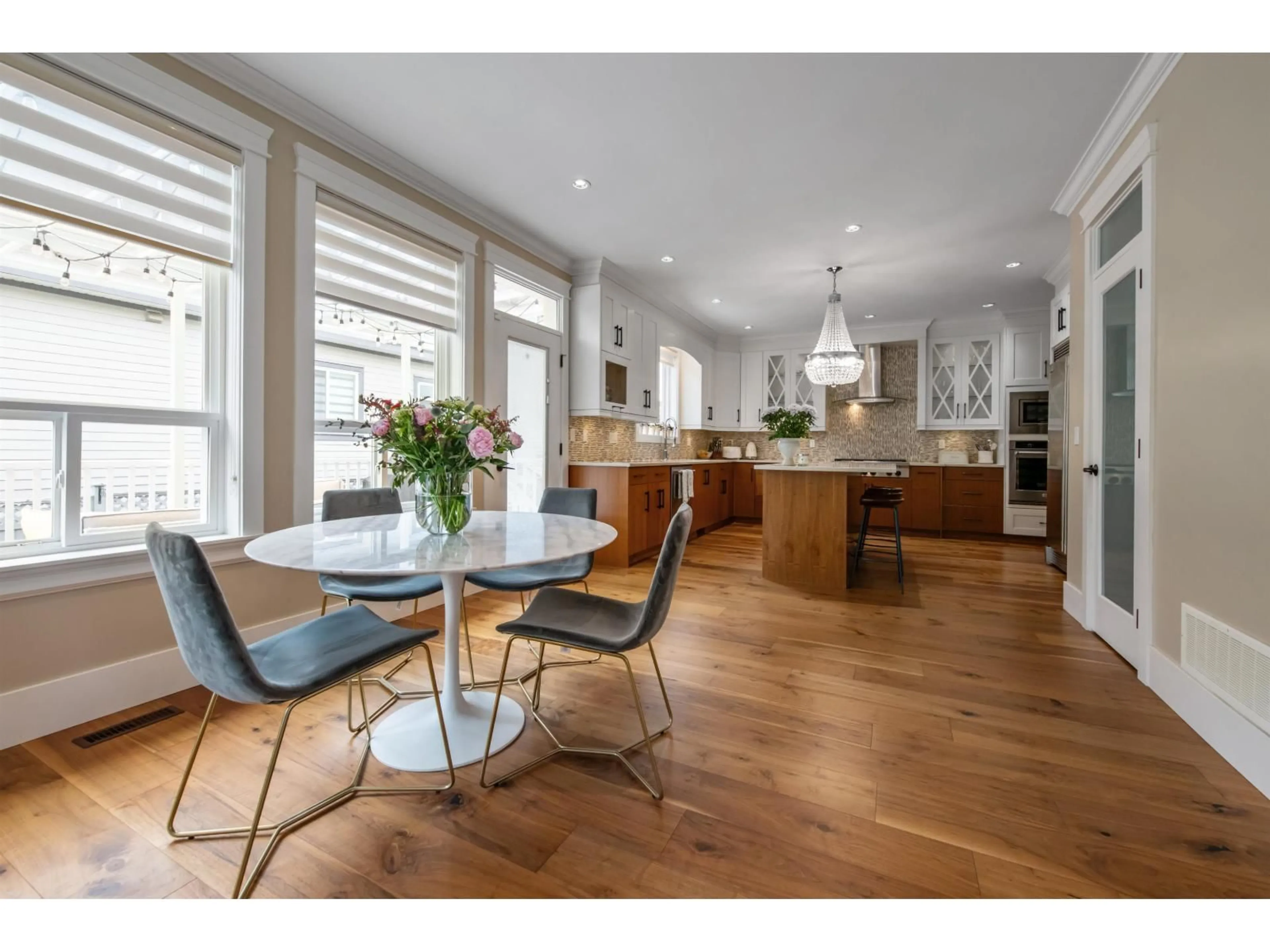 Open concept kitchen, wood/laminate floor for 20962 48 AVENUE, Langley British Columbia V3A3M1