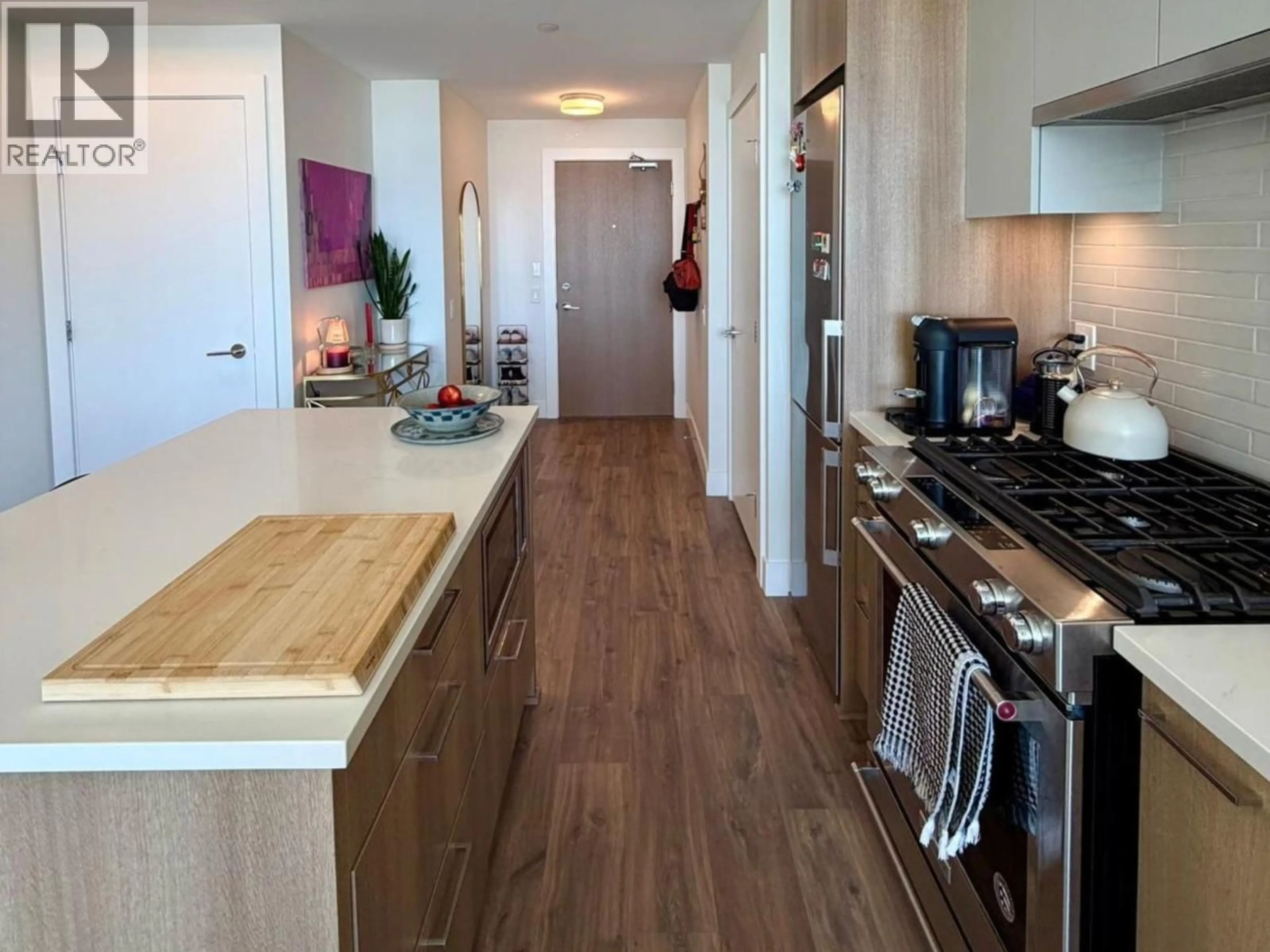 Open concept kitchen, wood/laminate floor for 1609 - 258 NELSON'S COURT, New Westminster British Columbia V3L0J9