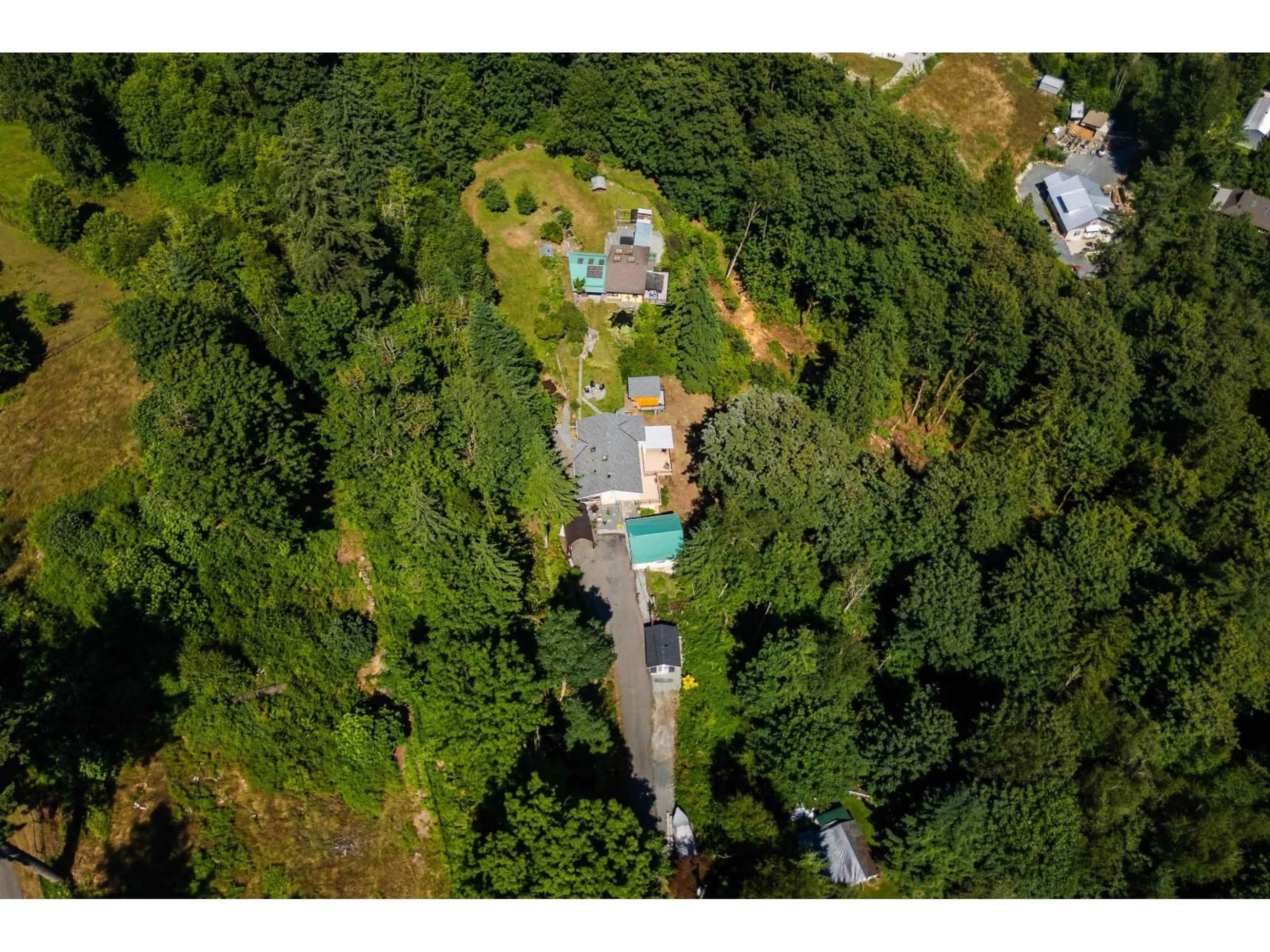 A pic from outside/outdoor area/front of a property/back of a property/a pic from drone, forest/trees view for 9560 MONTE VISTA STREET, Mission British Columbia V2V6B2