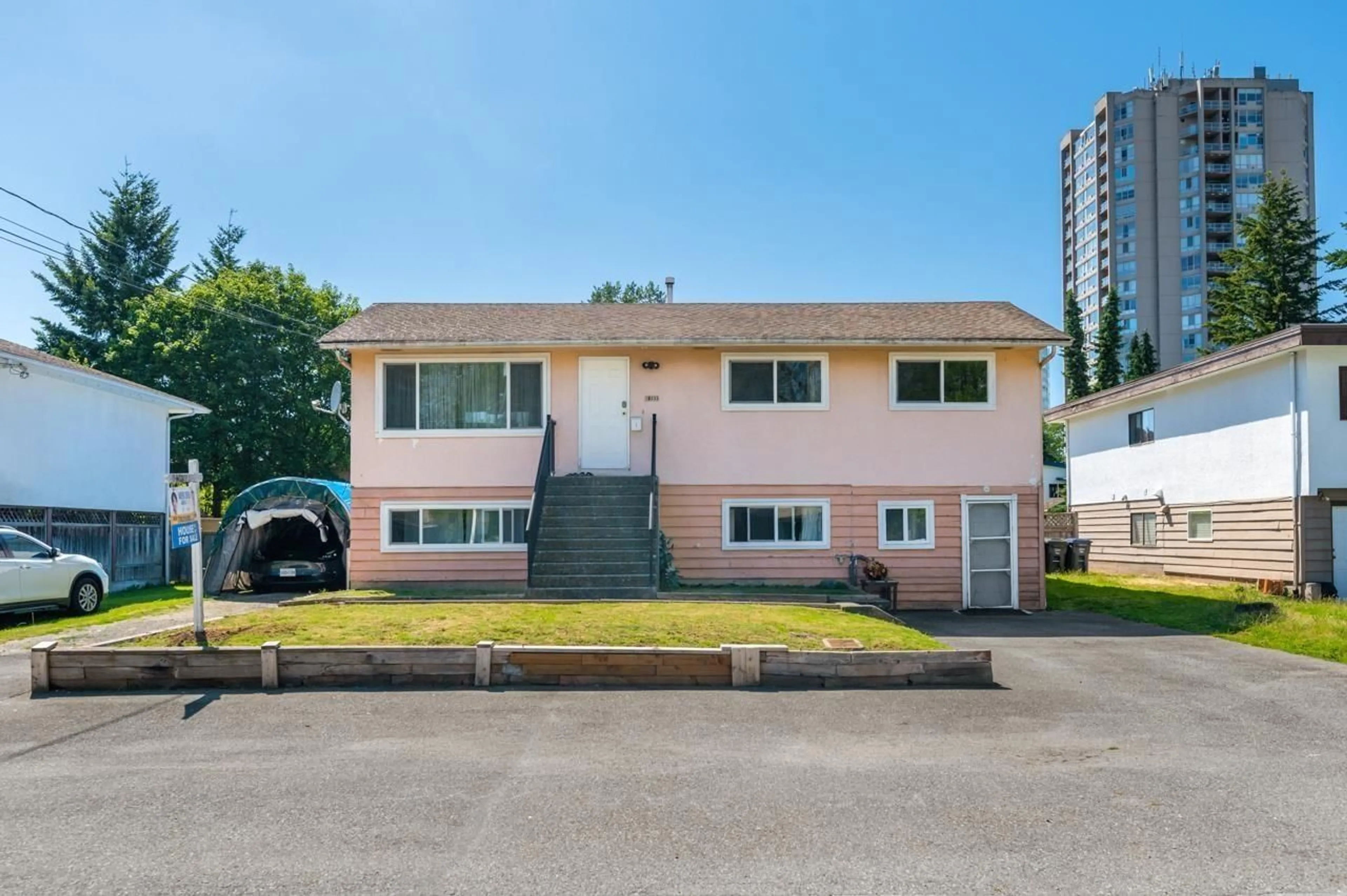 Home with vinyl exterior material, street for 10355 149A STREET, Surrey British Columbia V3R4A5
