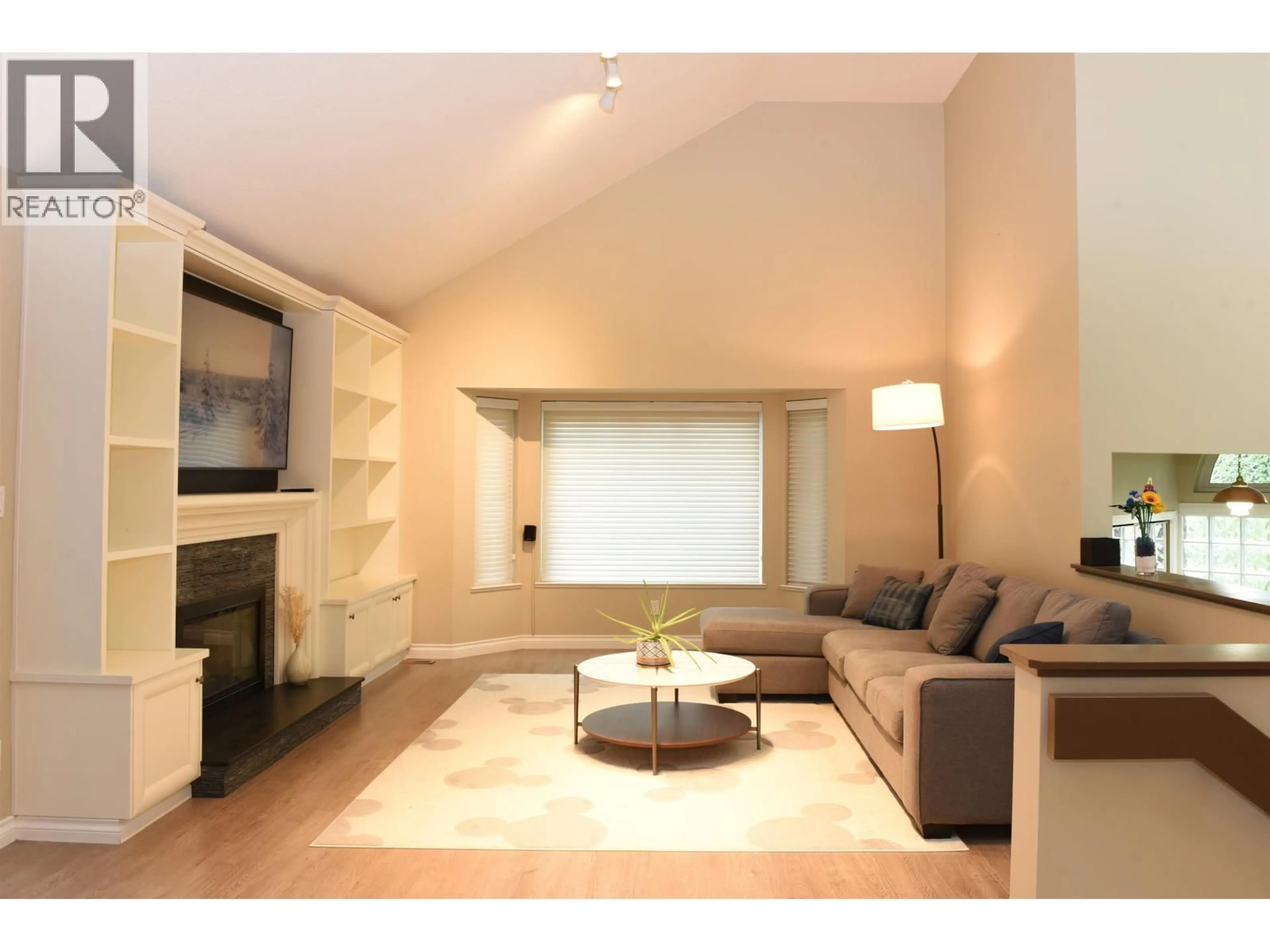 Living room with furniture, wood/laminate floor for 2220 PAULUS CRESCENT, Burnaby British Columbia V5A2M4