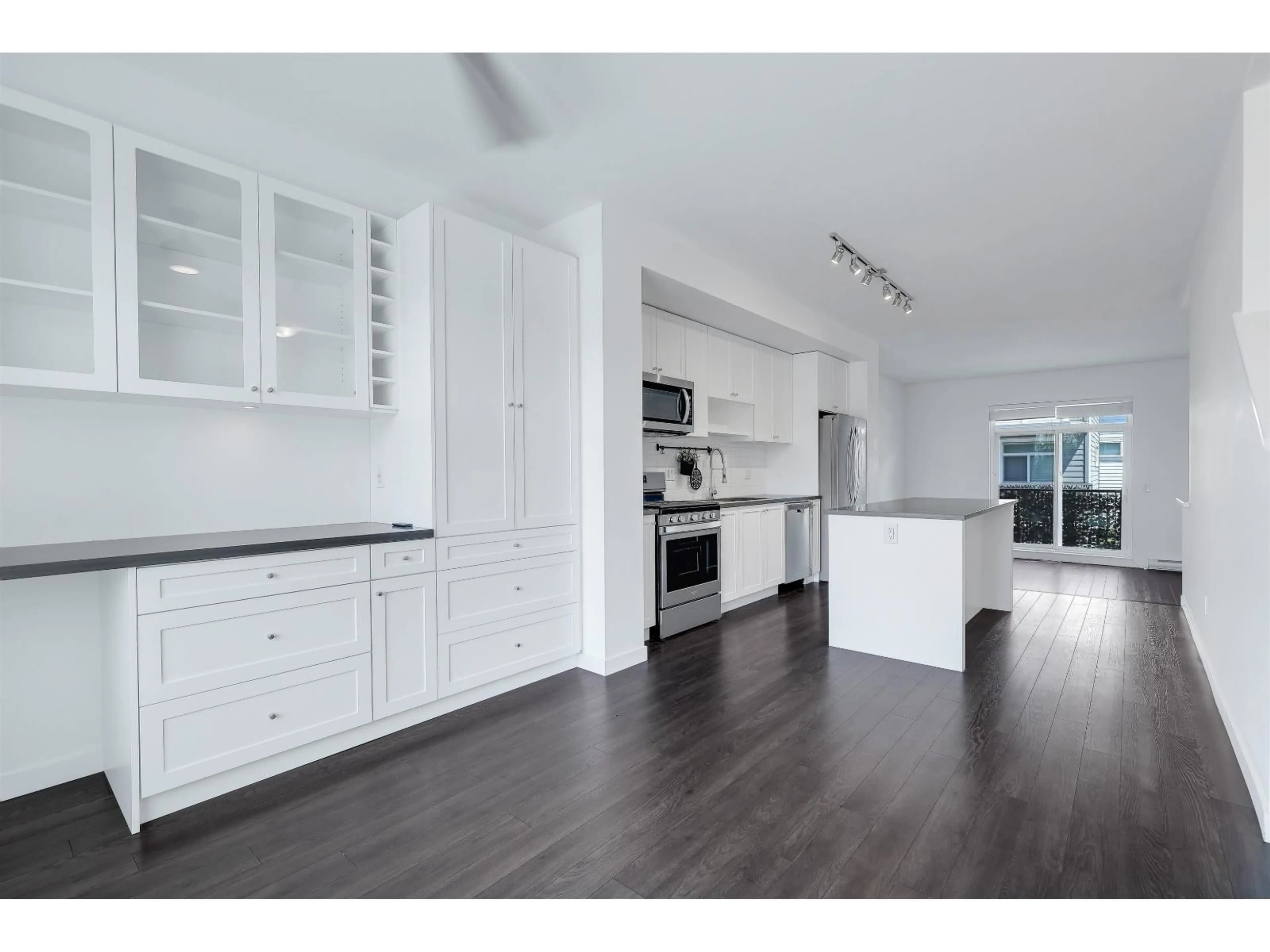 Open concept kitchen, wood/laminate floor for 49 - 16678 25 AVENUE, Surrey British Columbia V3Z0Z2