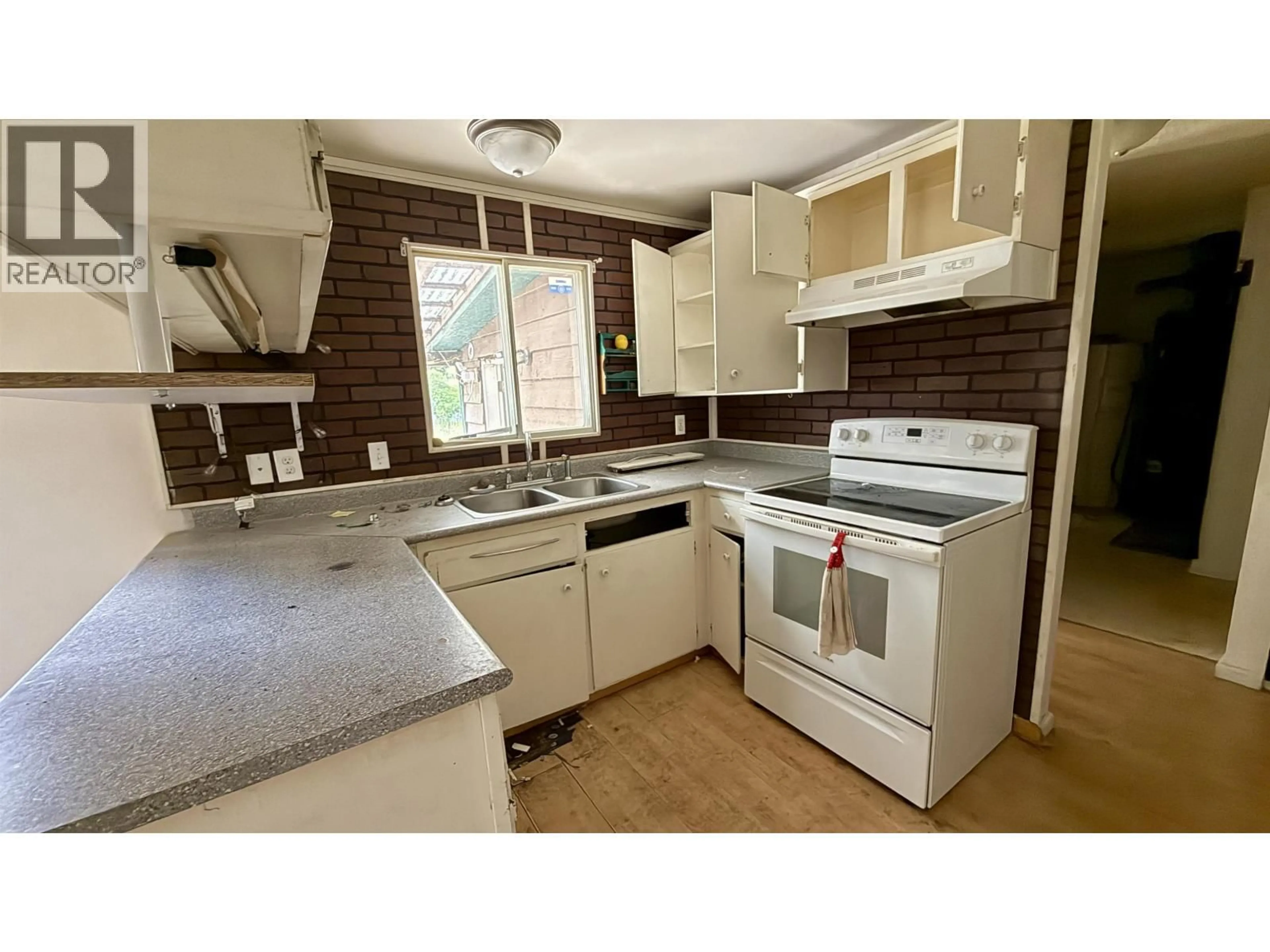 Standard kitchen, ceramic/tile floor for 5317 HELENA LAKE ROAD, 100 Mile House British Columbia V0K2E1