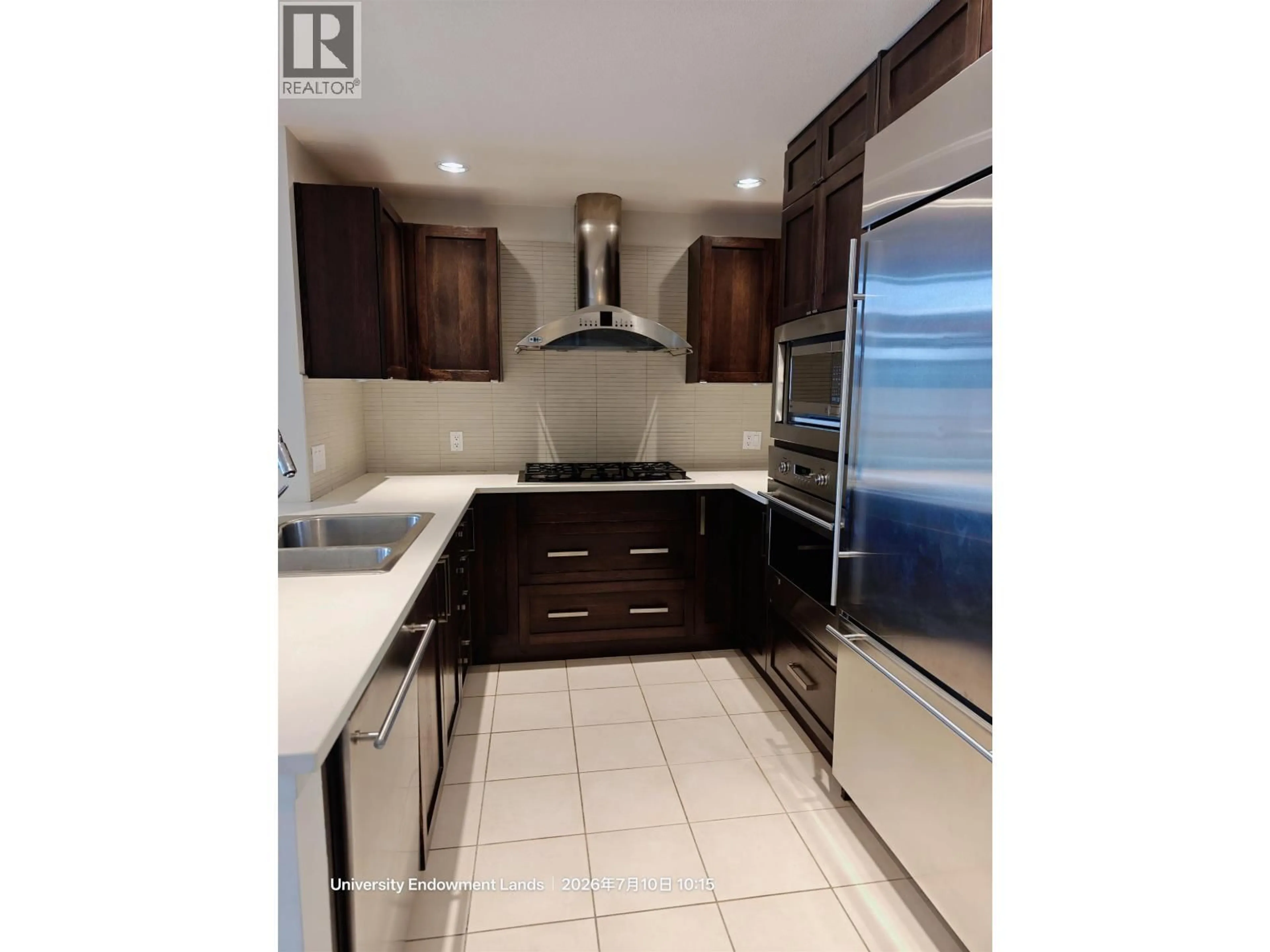 Open concept kitchen, ceramic/tile floor for 420 - 5777 BIRNEY AVENUE, Vancouver British Columbia V6S0A4