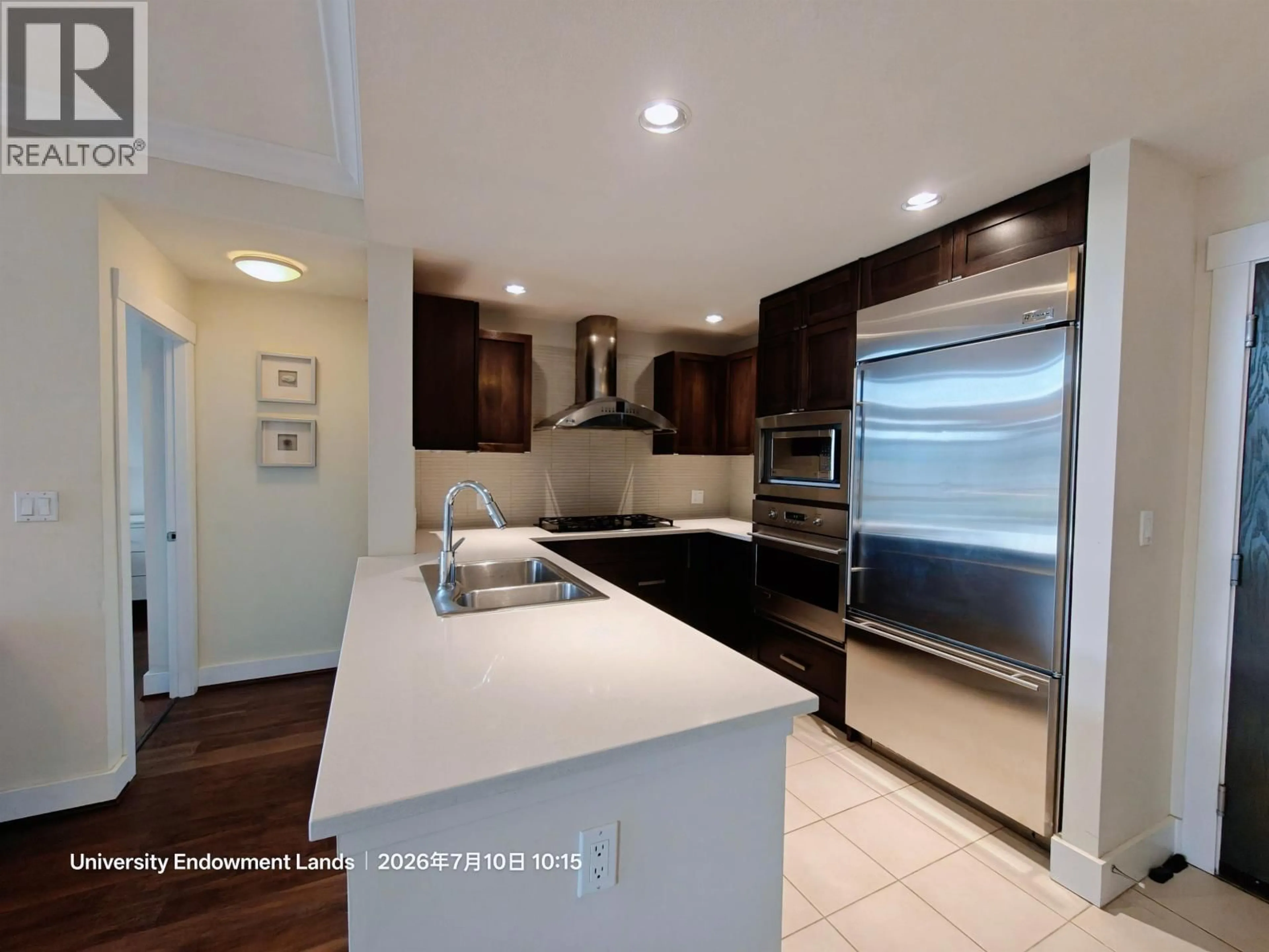 Open concept kitchen, ceramic/tile floor for 420 - 5777 BIRNEY AVENUE, Vancouver British Columbia V6S0A4