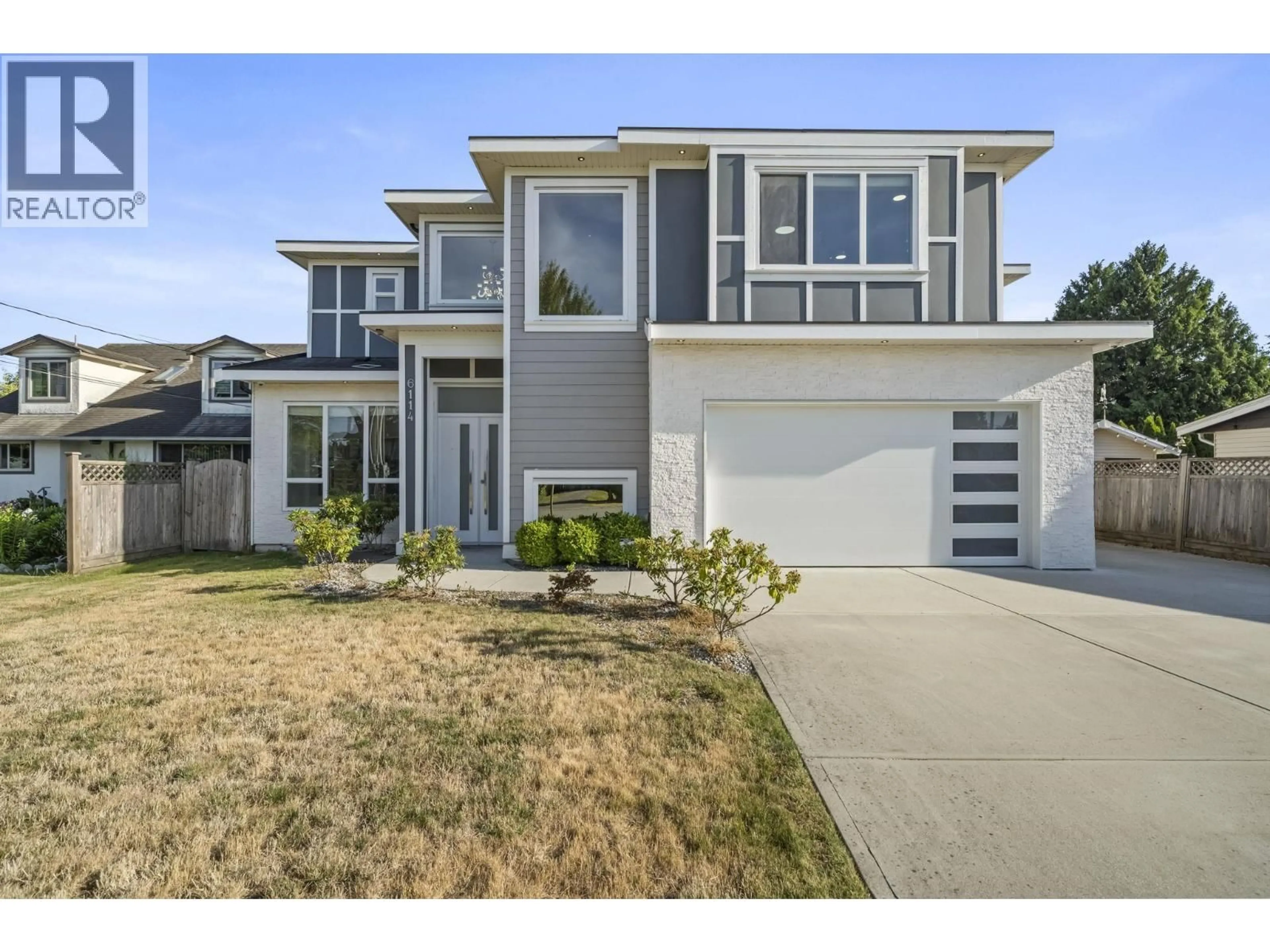 Home with vinyl exterior material, street for 6114 49B AVENUE, Delta British Columbia V4K1Z8