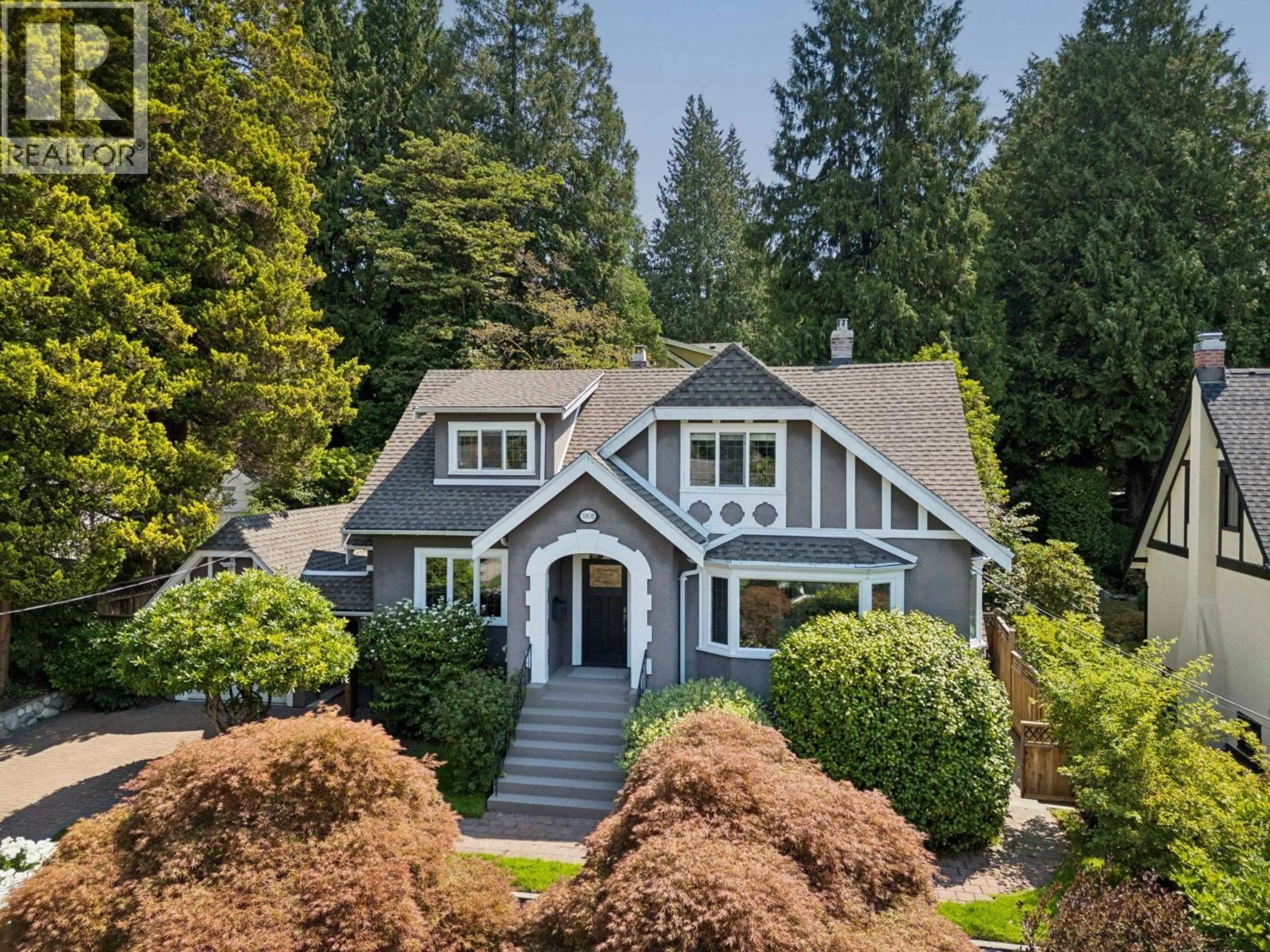 Home with vinyl exterior material, street for 5808 OLYMPIC STREET, Vancouver British Columbia V6N1Z6