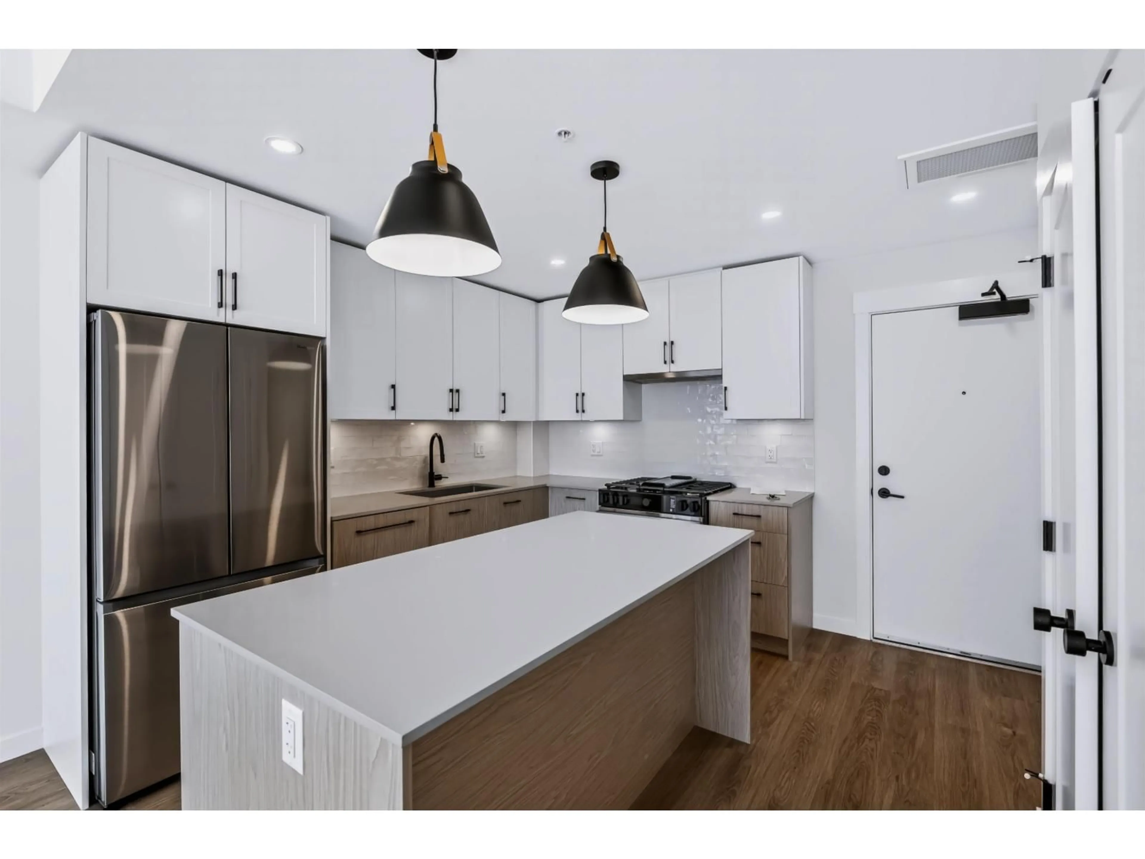 Open concept kitchen, unknown for 503 - 27249 ALDERGROVE TOWN CENTRE DRIVE, Langley British Columbia V4W3N7