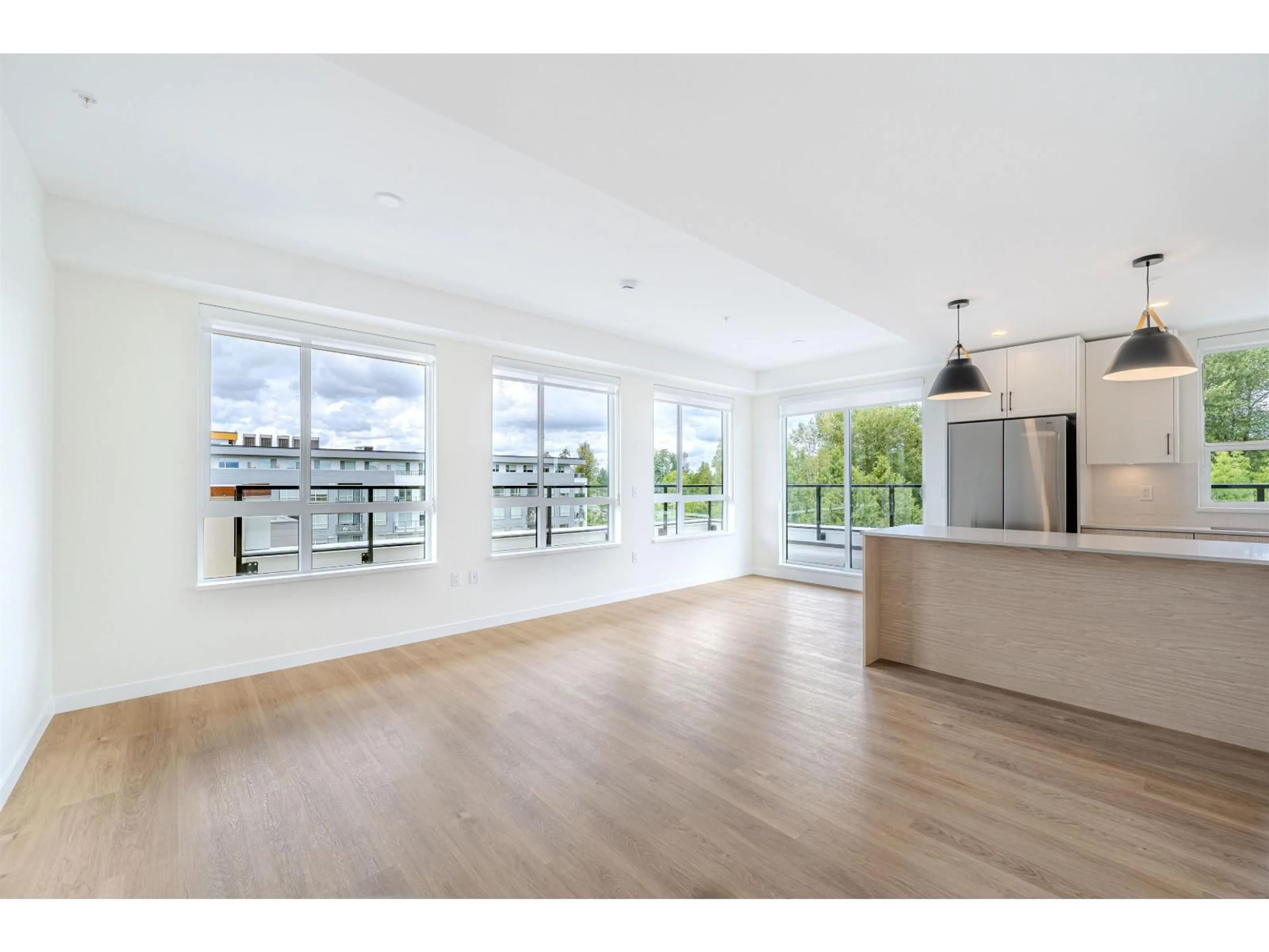 Open concept kitchen, unknown for 606 - 27249 ALDERGROVE TOWN CENTRE DRIVE, Langley British Columbia V4W3N7