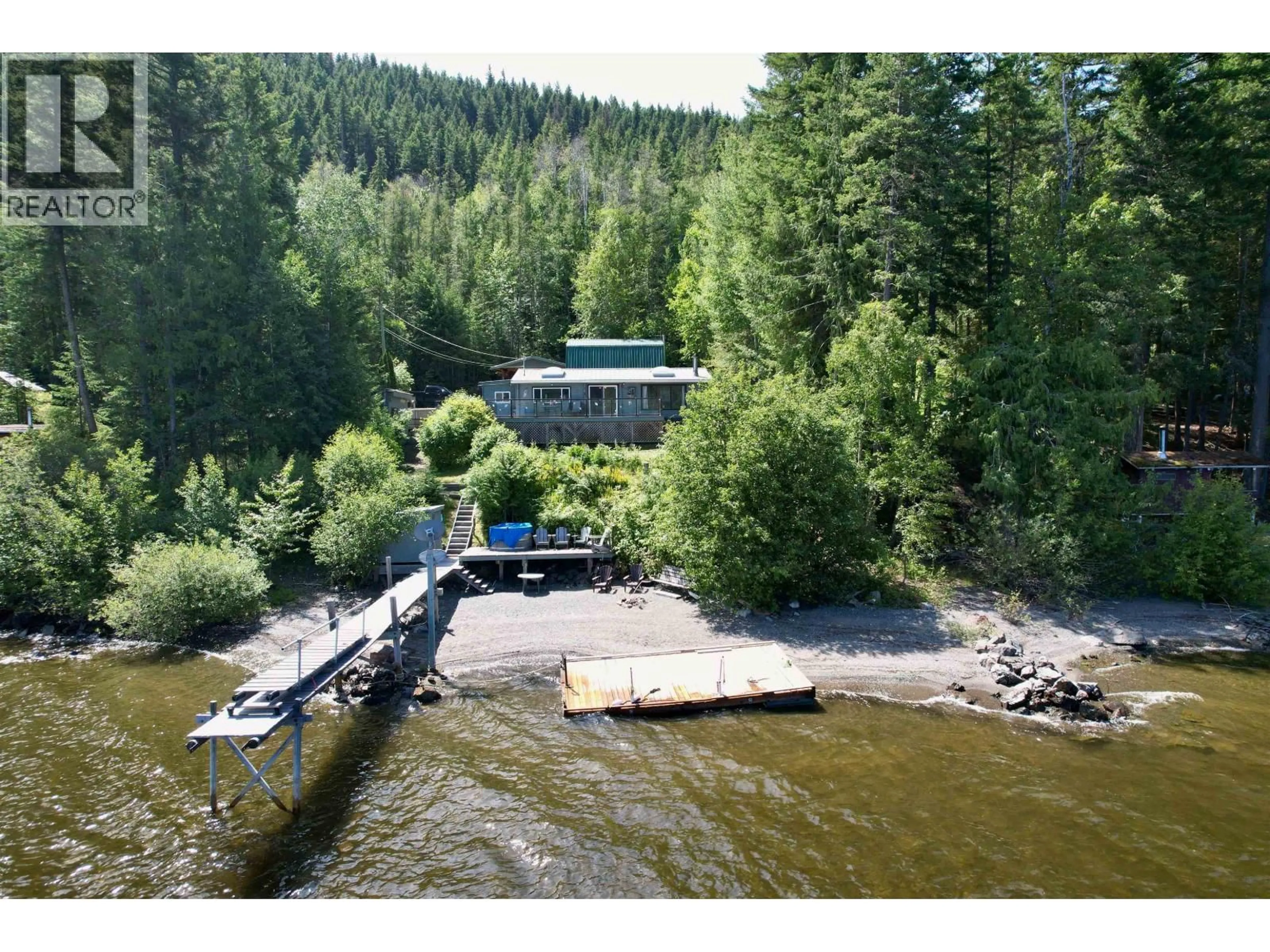 A pic from outside/outdoor area/front of a property/back of a property/a pic from drone, water/lake/river/ocean view for 9045 MAHOOD LAKE ROAD, Canim Lake British Columbia V0K1J0