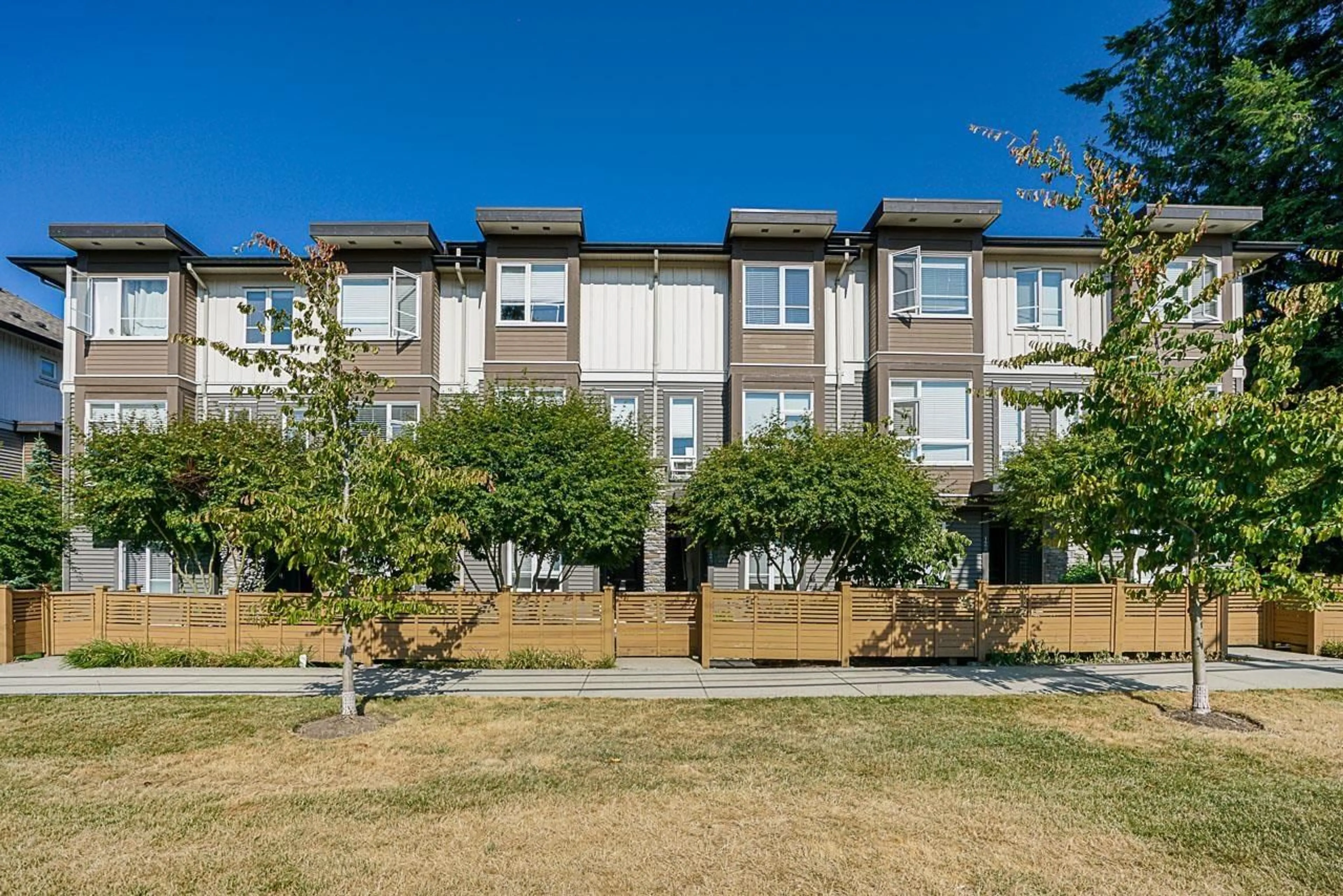 A pic from outside/outdoor area/front of a property/back of a property/a pic from drone, street for 129 - 5888 144 STREET, Surrey British Columbia V3X0G8