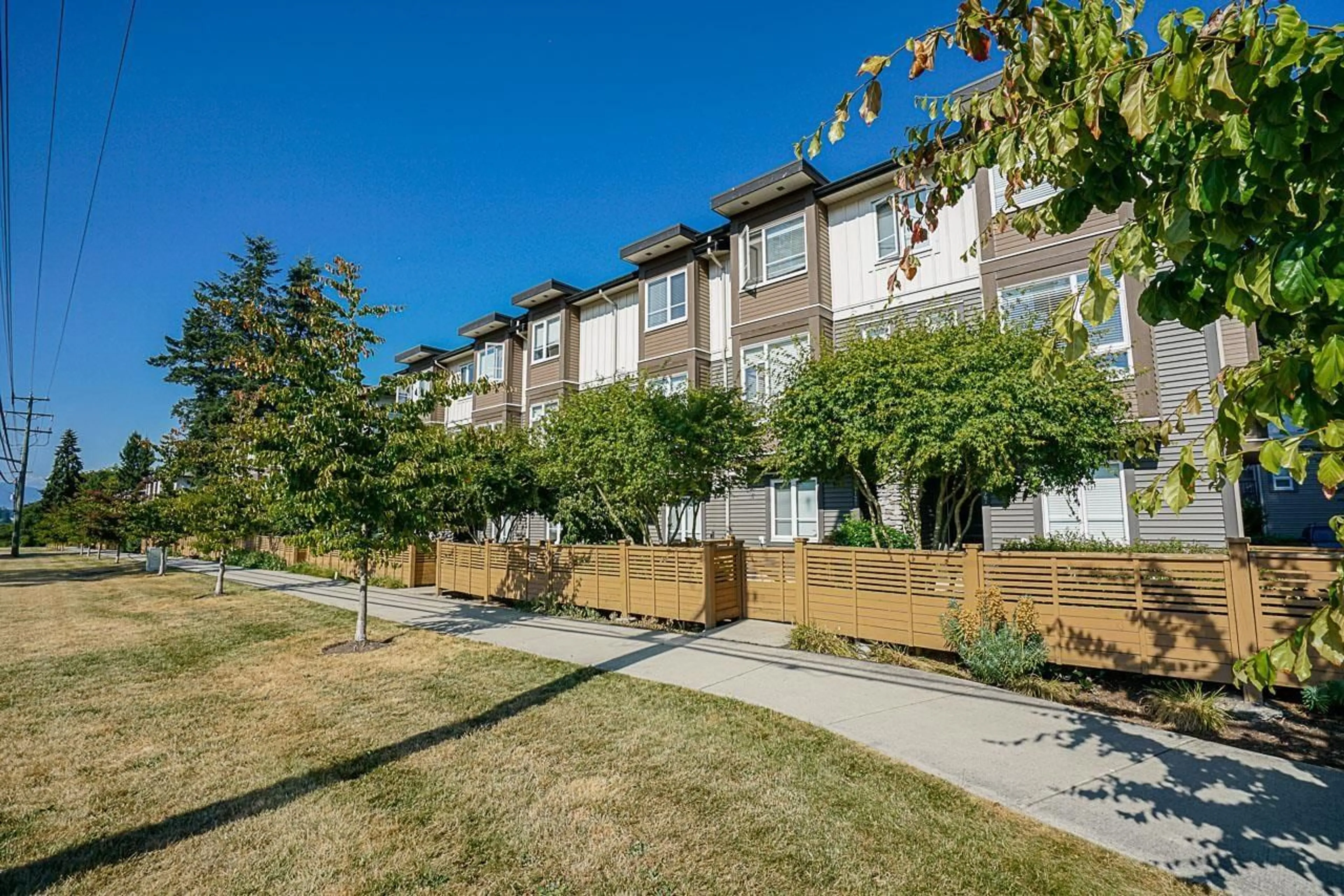 A pic from outside/outdoor area/front of a property/back of a property/a pic from drone, street for 129 - 5888 144 STREET, Surrey British Columbia V3X0G8